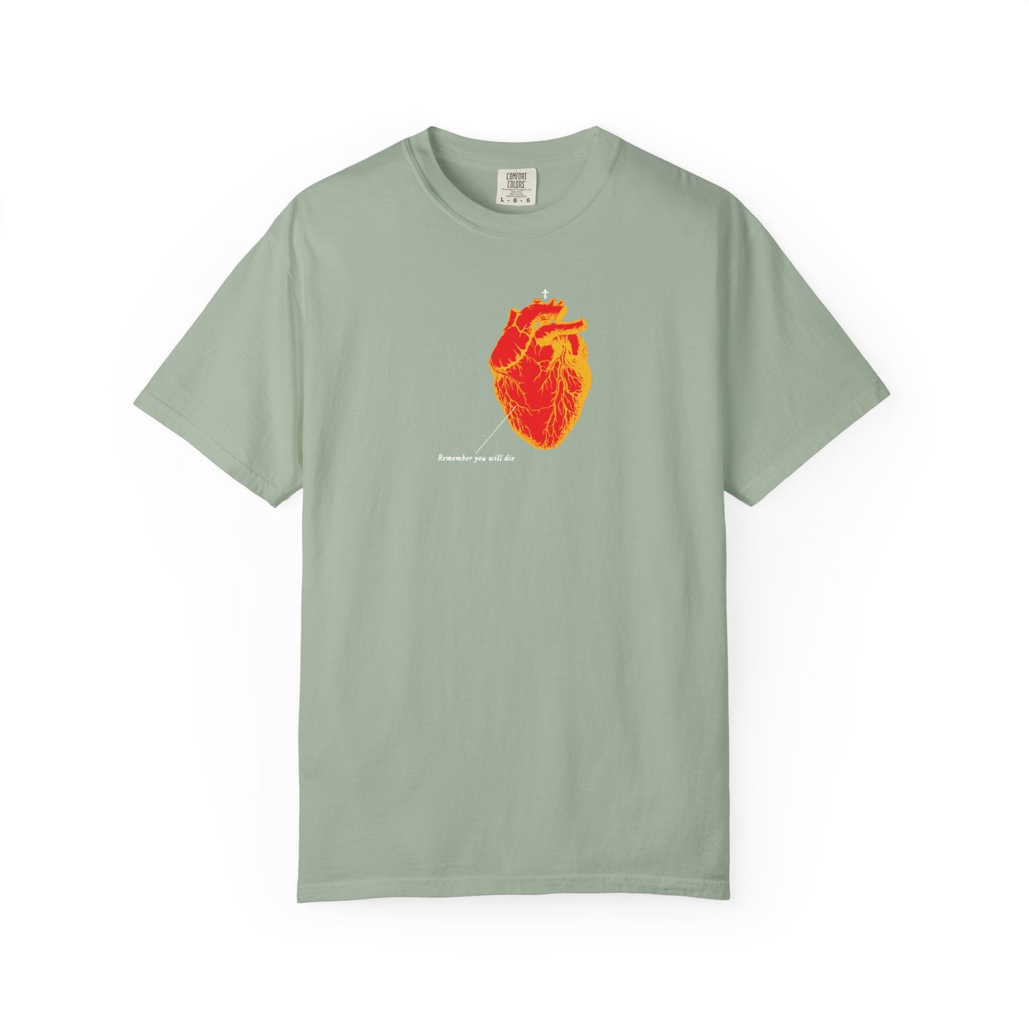 The Bay-colored heavyweight cotton unisex tee features a red and orange antique medical heart design with text, inspired by memento mori and titled "Remember You Will Die Antique Medical Textbook Heart Design.