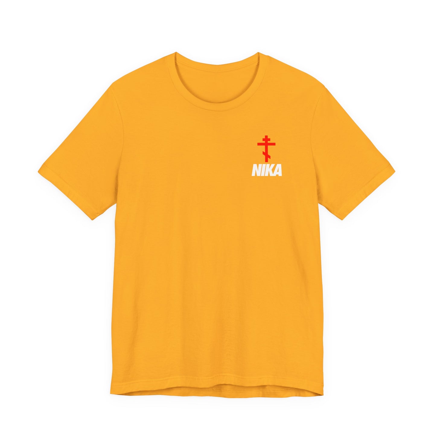 Gold t-shirt featuring a red Orthodox cross Christogram with bold white NIKA text, a NIKE logo mashup, and "Jesus Christ Conquers" message in a small design on the upper left chest.