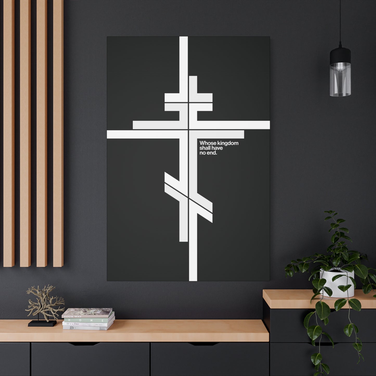 The "Whose Kingdom Shall Have No End" Christian canvas art features a modernist minimalist Orthodox Cross with Luke 1:32-33, shown above a cabinet on a dark wall.
