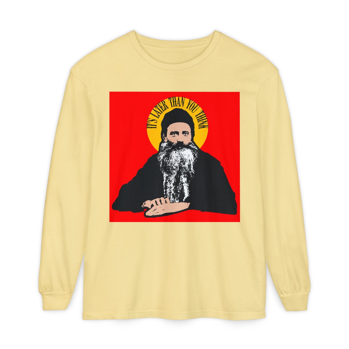 Butter-colored long-sleeve shirt featuring Fr Seraphim Rose’s quote “It's Later Than You Think” in a yellow halo, inspired by the modern American Orthodox Christian saint.