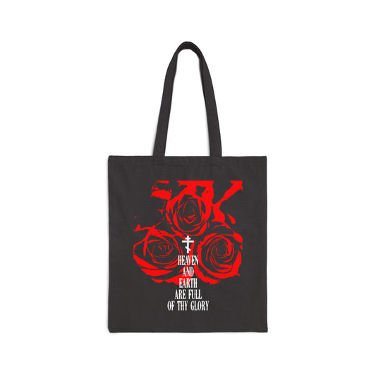 The Remembrance of Death cotton canvas tote bag features three red roses, a white cross, and the text "HEAVEN AND EARTH ARE FULL OF THY GLORY" from the Orthodox liturgical hymn, styled in western typography.
