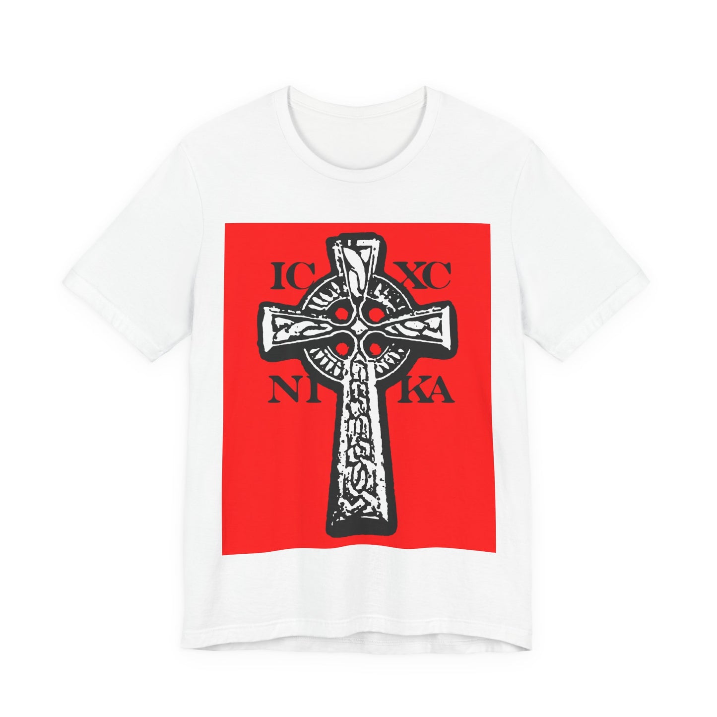 White t-shirt featuring the ICXC NIKA Celtic Knotwork Cross in black and white on a red background, with "Jesus Christ Conquers" in traditional Orthodox Christian style.