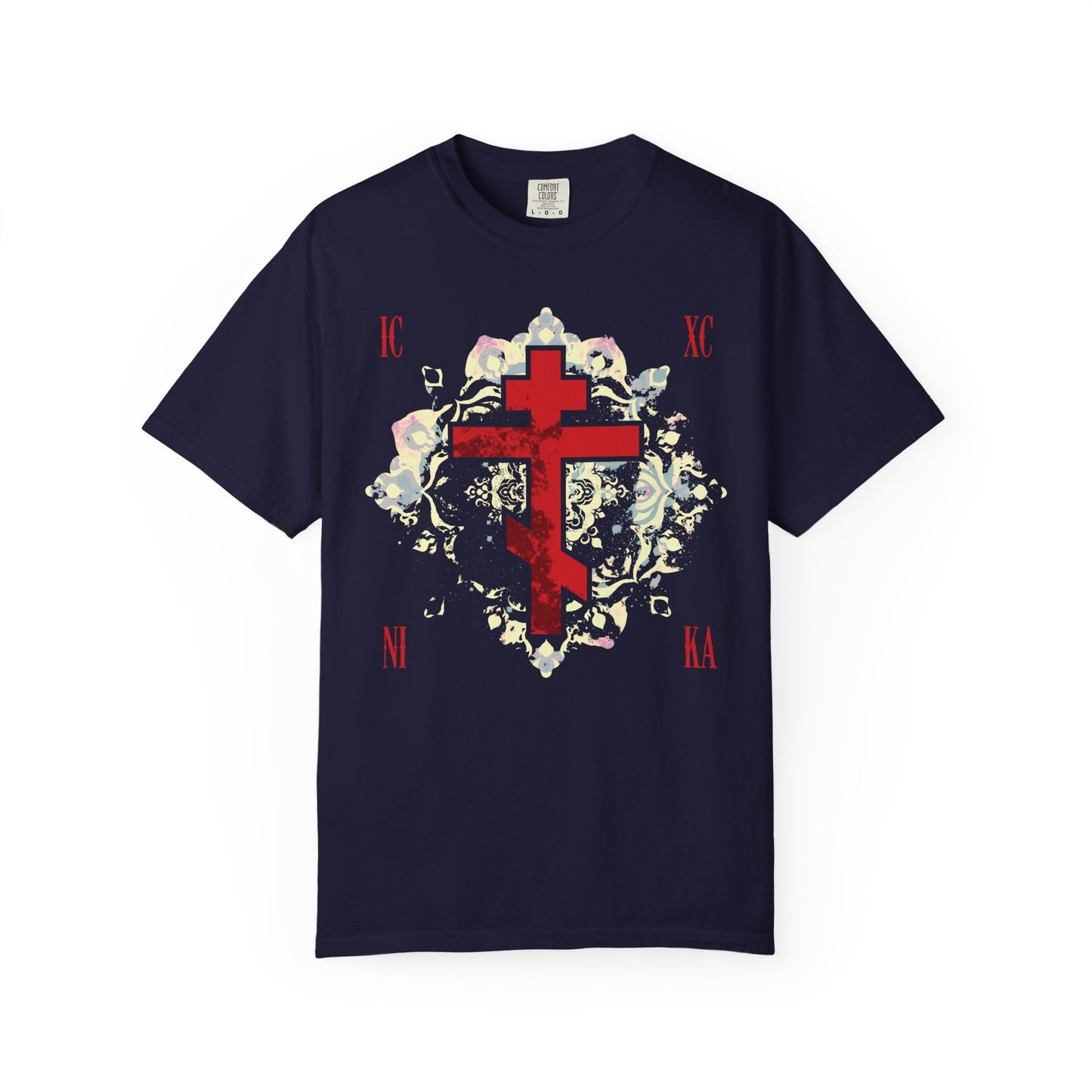 True Navy heavyweight cotton unisex tee featuring a textured red Orthodox cross, gold medieval floral background, and ICXC NIKA text—honoring Jesus Christ’s victory and inspired by St John of Kronstadt.