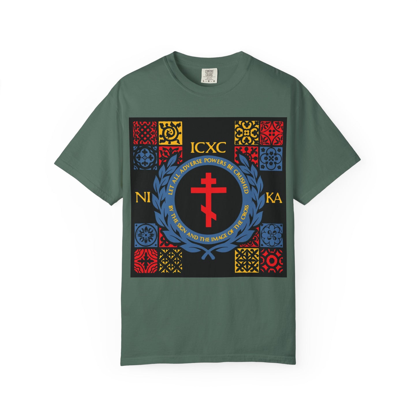 Blue Spruce heavyweight cotton unisex T-shirt, "Let All Adverse Powers Be Crushed," featuring a vibrant red, yellow, and blue ICXC NIKA Orthodox cross and medieval tile design inspired by Katavasia hymns, with decorative patterns reminiscent of Red Sea motifs.