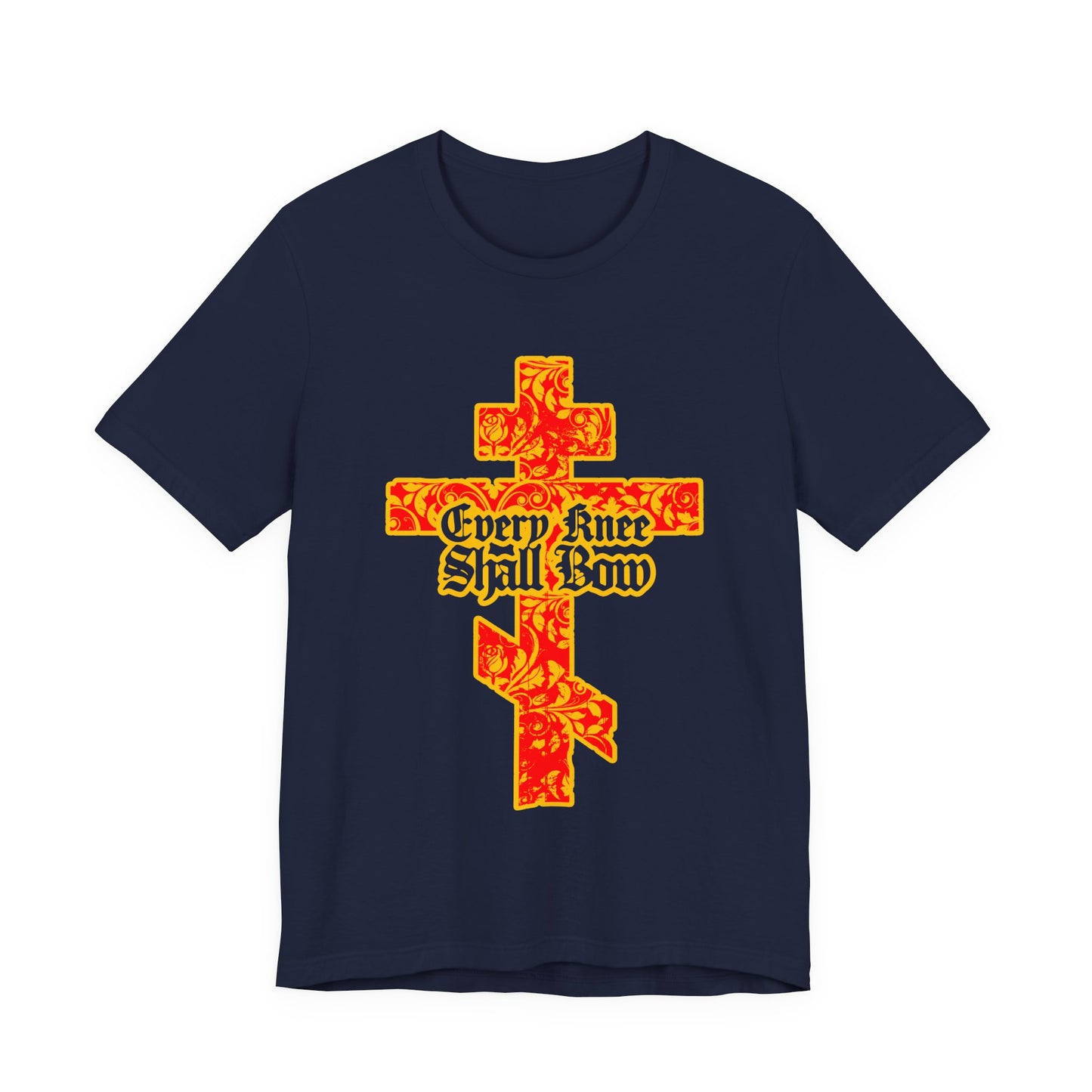 Navy unisex tee with a gold and red floral Orthodox cross and gothic “Every Knee Shall Bow” lettering, inspired by Isaiah 45:22-24 and Philippians 2:7-11.