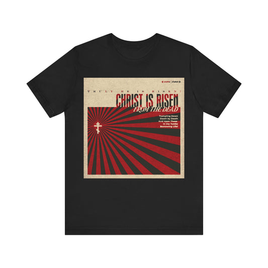 Black Orthodox Christian T-shirt featuring a retro LP cover design with a bold "Christ is Risen from the Dead" Paschal Troparion graphic—a striking reminder of the resurrection.