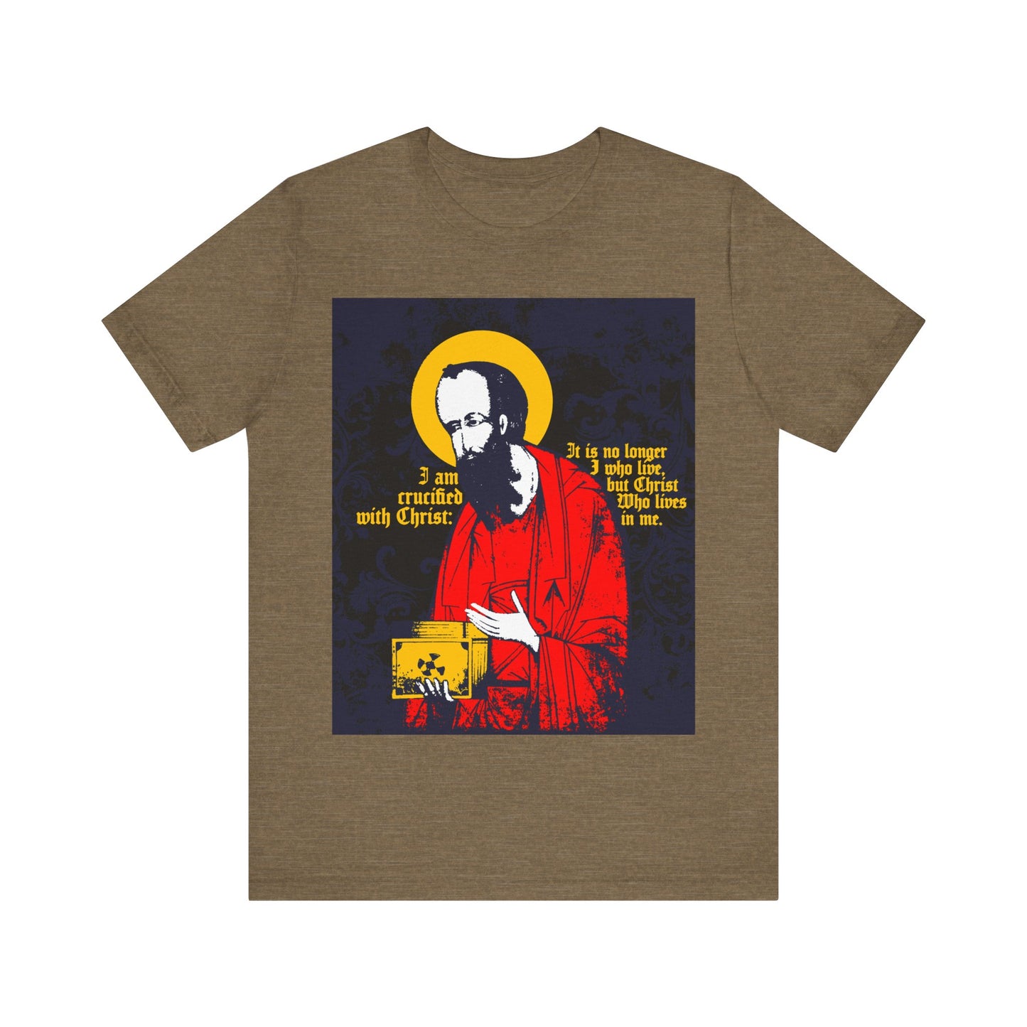 Heather Olive t-shirt featuring St Paul holding a gospel in iconographic style, with "I am crucified with Christ" (Galatians 2:20)—a bold Orthodox Christian statement of new life in faith.