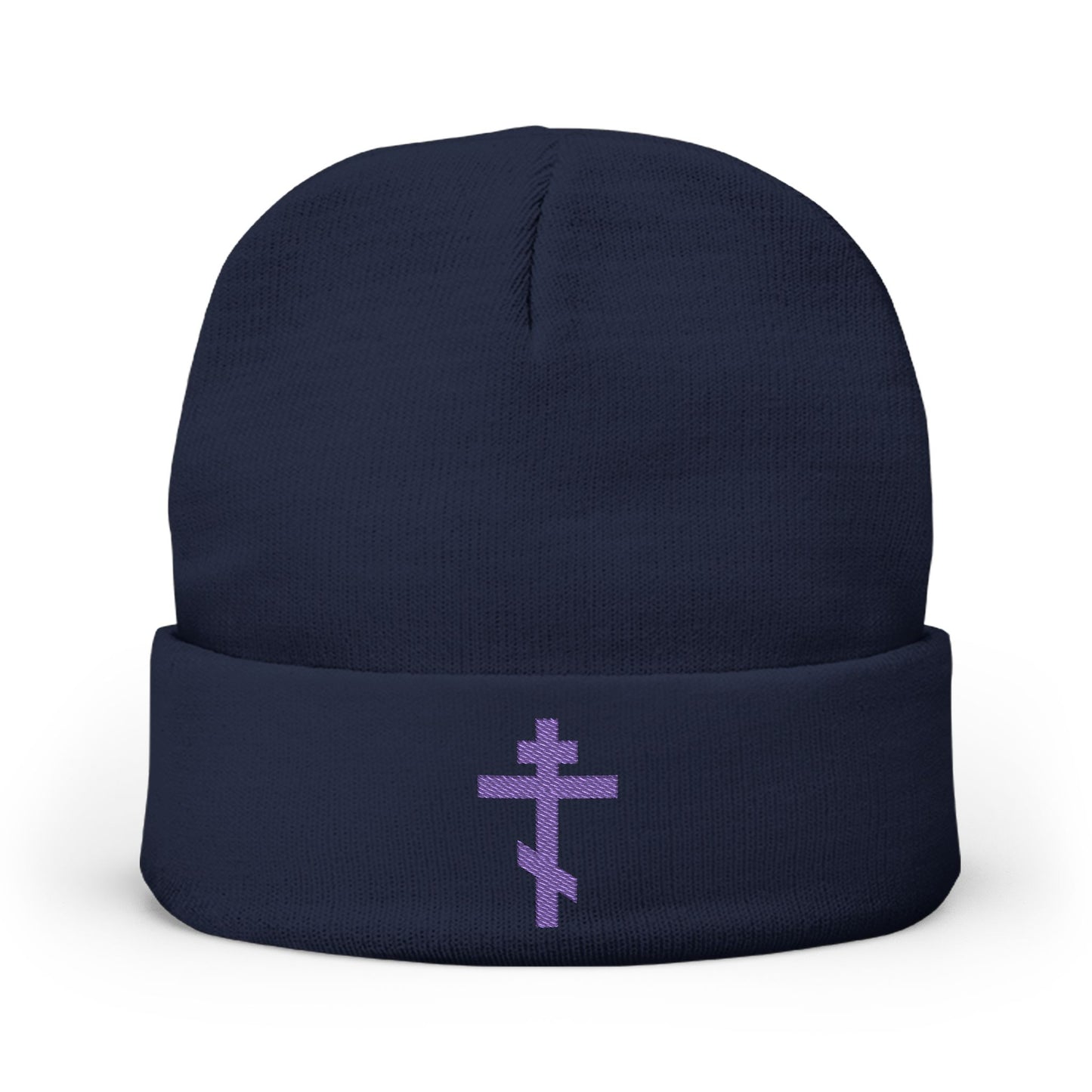 Dark navy knit beanie featuring an embroidered blue-purple Orthodox TriBar Cross and "Nail My Passions to the Wood of Thy Precious Cross O Lord," symbolizing Orthodox Christian faith.