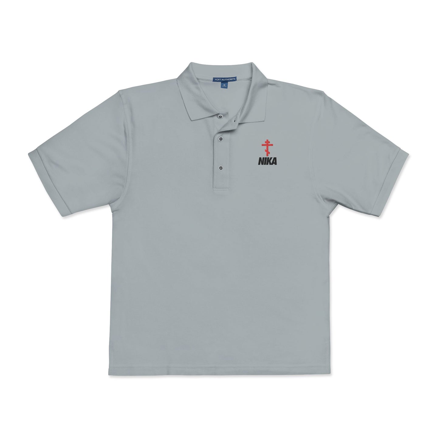 Cool grey NIKA polo with embroidered red Orthodox cross and black text, inspired by Revelation 3:21 and the victory of Christ. Features a "NIKE-logo" mashup design—perfect for athletic ascetic fashion and Christian expression.