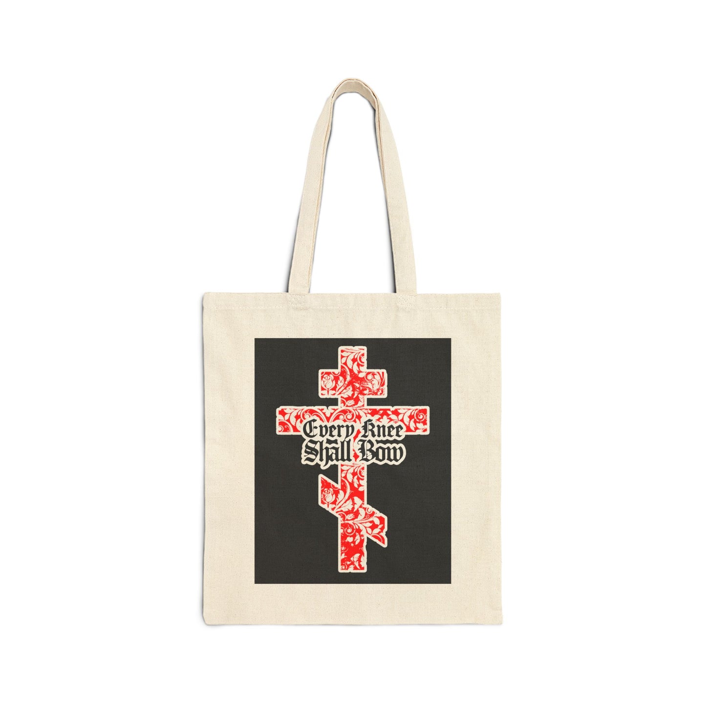 Beige tote bag with a gold and red floral Orthodox cross and gothic "Every Knee Shall Bow" lettering, inspired by Isaiah 45:22-24 and Philippians 2:7-11—declaring Jesus Christ is Lord.