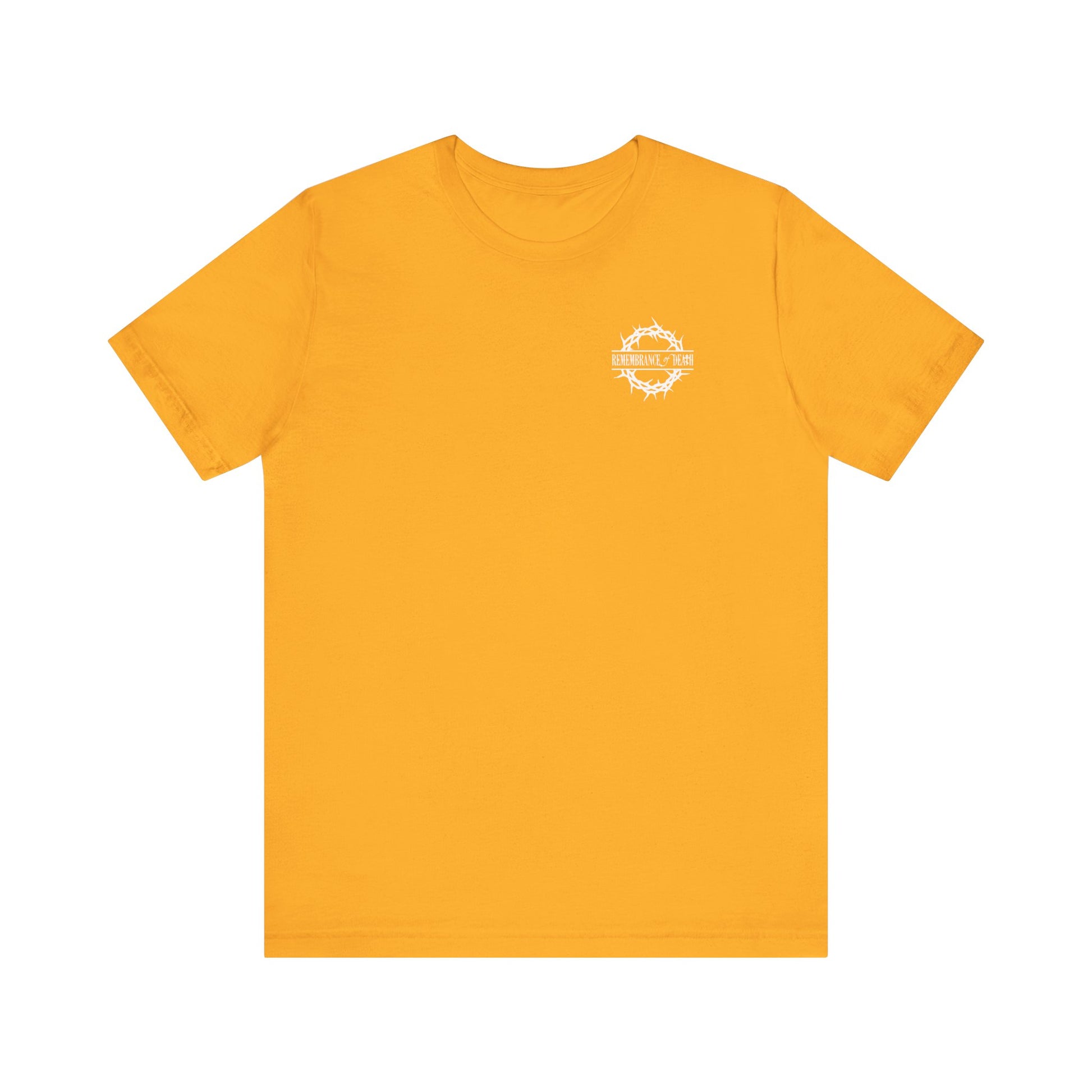 Bold orange "Dead to this World" Orthodox Christian t-shirt with a small white branded front, featuring a flower cross and skull design in 70s typography—symbolizing the journey towards dispassion.