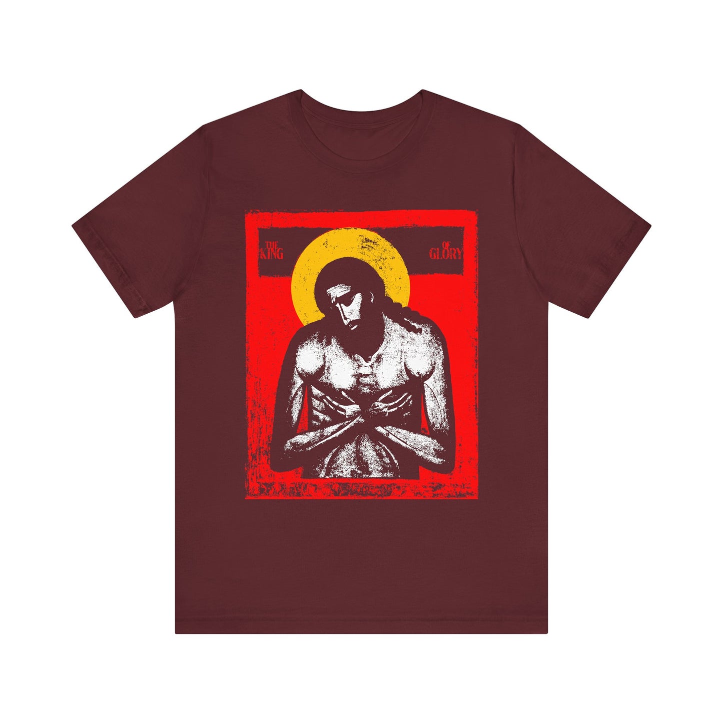 Maroon tee featuring "The King of Glory Jesus Christ 'Extreme Humility' IconoGraphic" in red, yellow, white, and black—Christian devotional design on lightweight cotton.