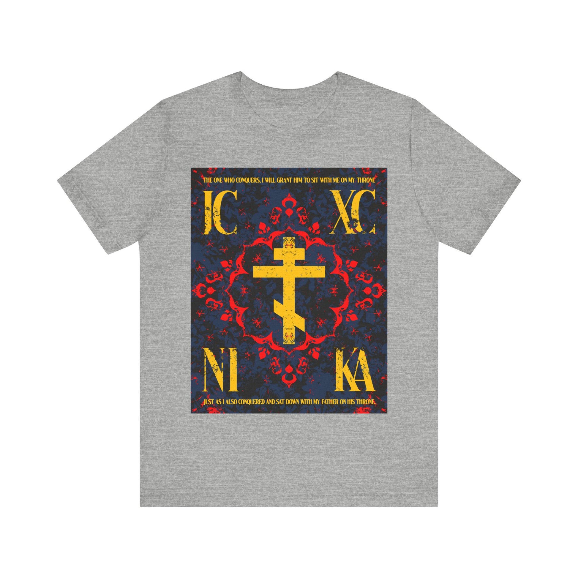 Athletic Heather IC XC NIKA Orthodox Cross T-shirt featuring a medieval floral design, Cyrillic text, and "The One Who Conquers" (Revelation 3:21), celebrating faith and Orthodox Christian values.