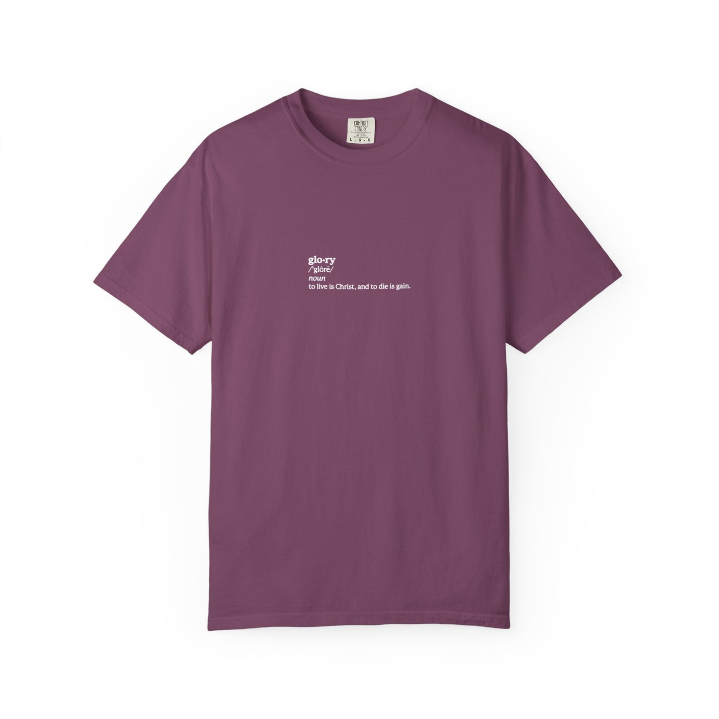 Berry heavyweight cotton unisex tee featuring small white chest text: "glory now: to live is Christ, and to die is gain"—inspired by Philippians 1:21. Part of the Glory Definition line for ascetic Christian living.