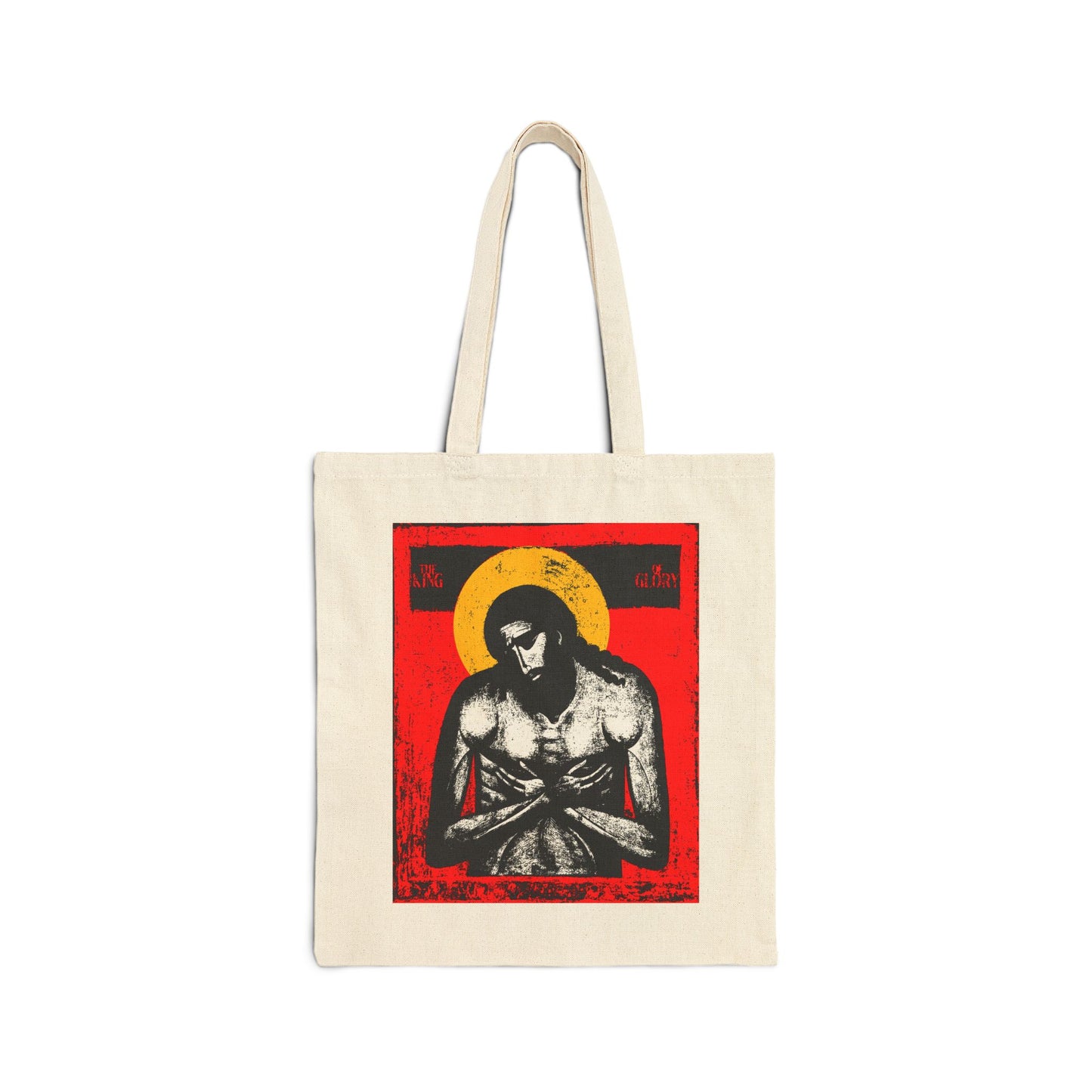 Natural-colored tote bag featuring "The King of Glory Jesus Christ 'Extreme Humility' IconoGraphic" artwork in red, yellow, white, and black—a Christian devotional design inspired by Isaiah 53.