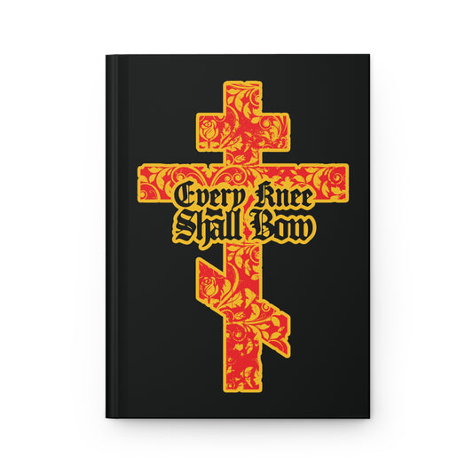 A Christian journal titled "Every Knee Shall Bow (Isaiah 45:22-24, Phil 2:7-11)" features a gold and red floral Orthodox cross with gothic lettering on a black cover, inspired by Bible verses about Jesus Christ.