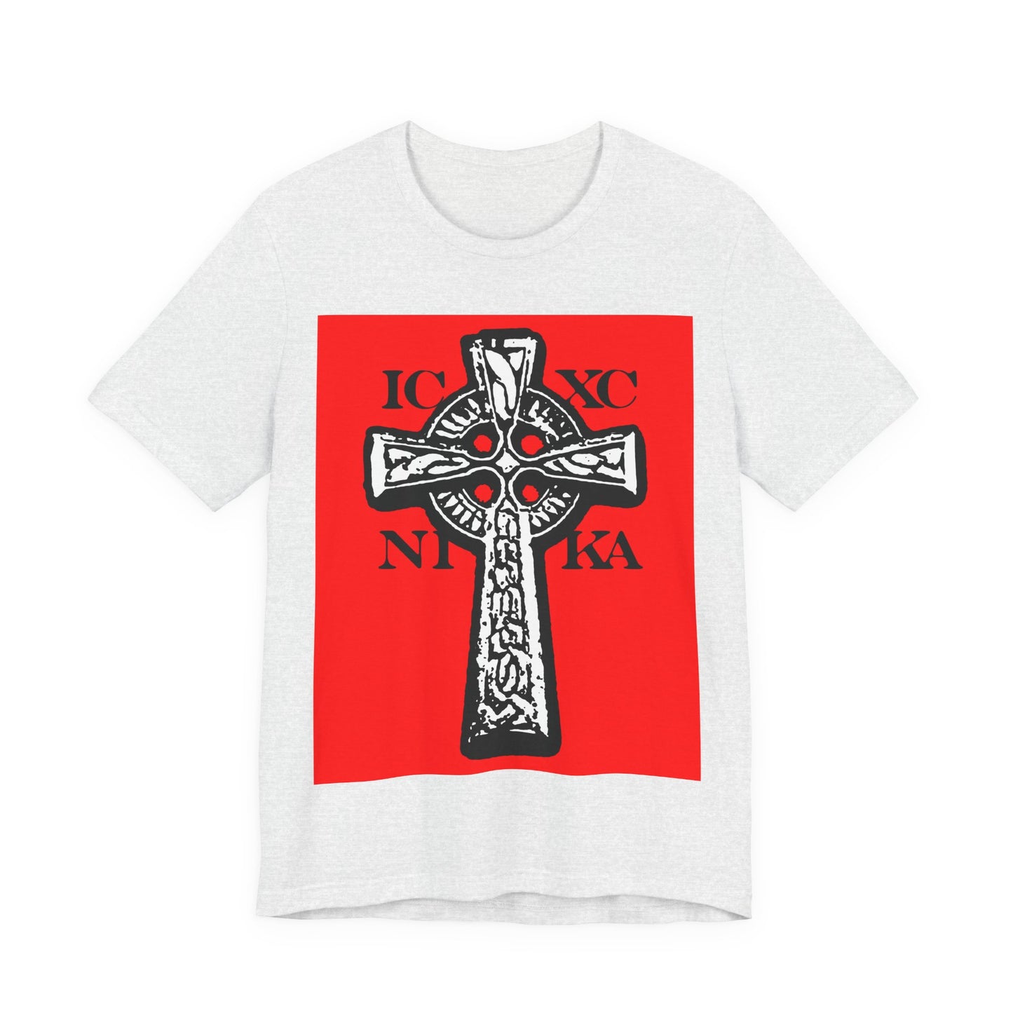 Ash T-shirt with a bold red rectangle featuring a black and white ICXC NIKA Celtic Knotwork Cross, Greek letters, and "Jesus Christ Conquers" design in traditional Orthodox Christian style.