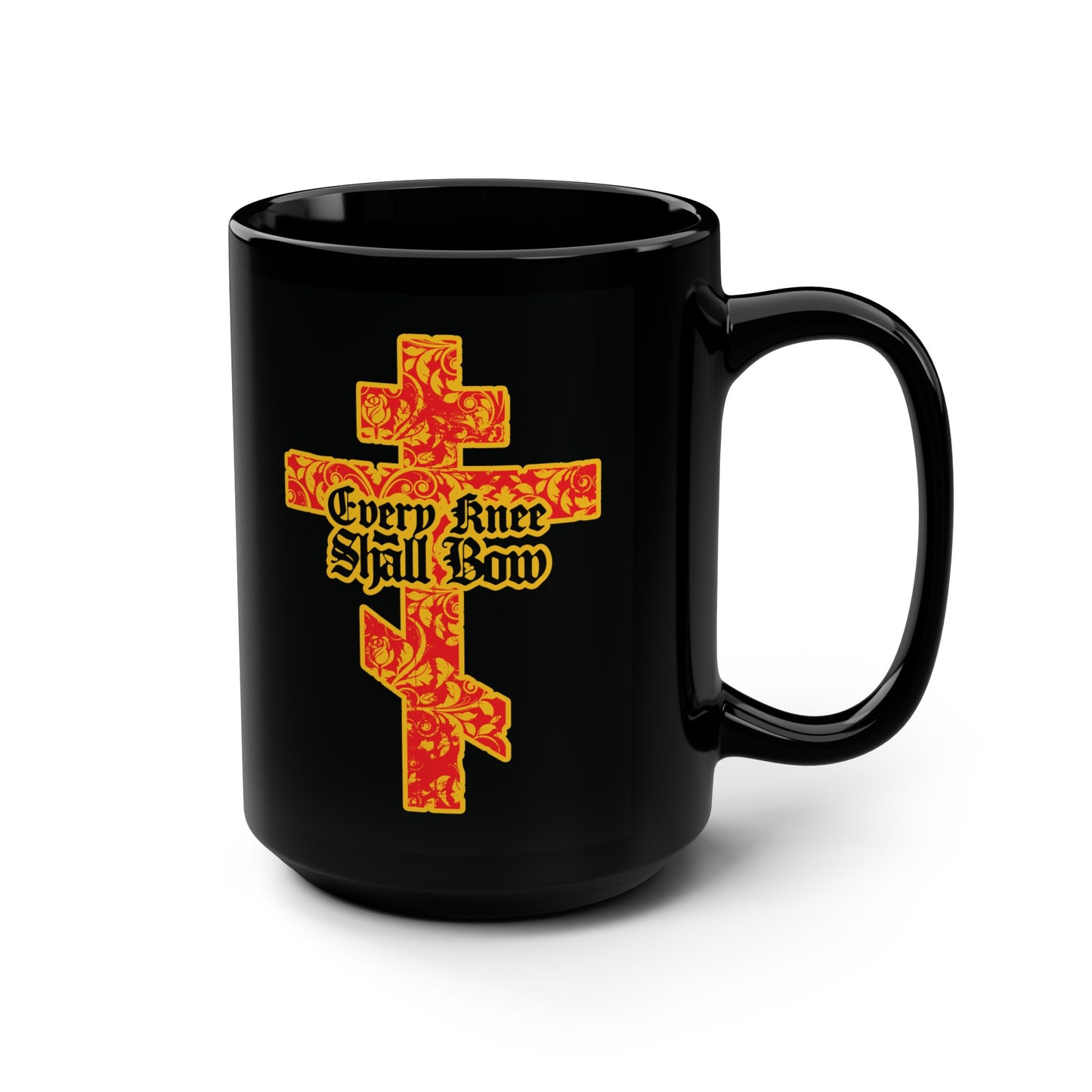 Black mug featuring a gold and red floral Orthodox cross with gothic "Every Knee Shall Bow" text, inspired by Isaiah 45:22-24 and Phil 2:7-11.