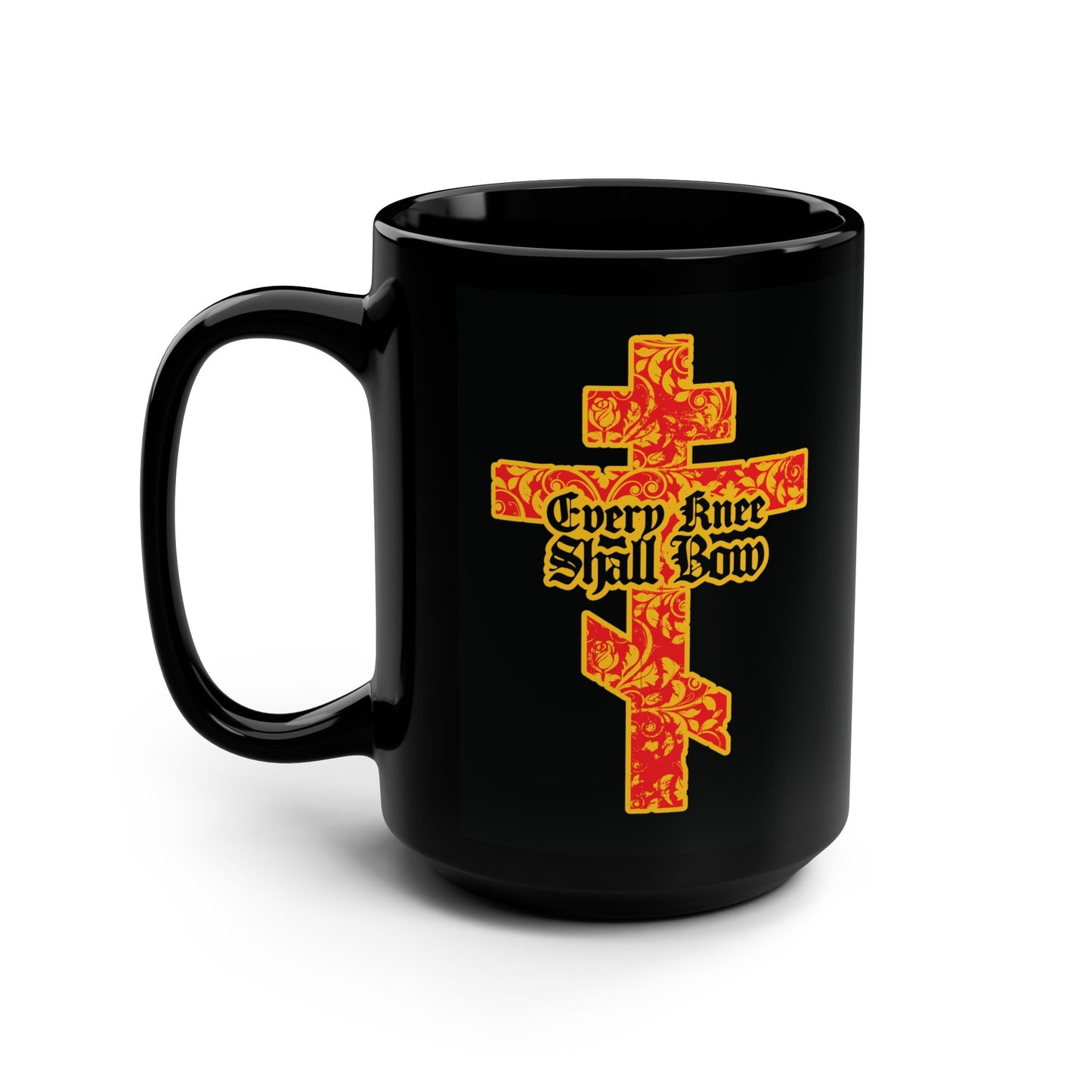 Black mug with gold and red floral Orthodox cross and gothic "Every Knee Shall Bow" text, inspired by Isaiah 45:22-24 and Philippians 2:7-11. Christian design declares Jesus Christ is Lord.