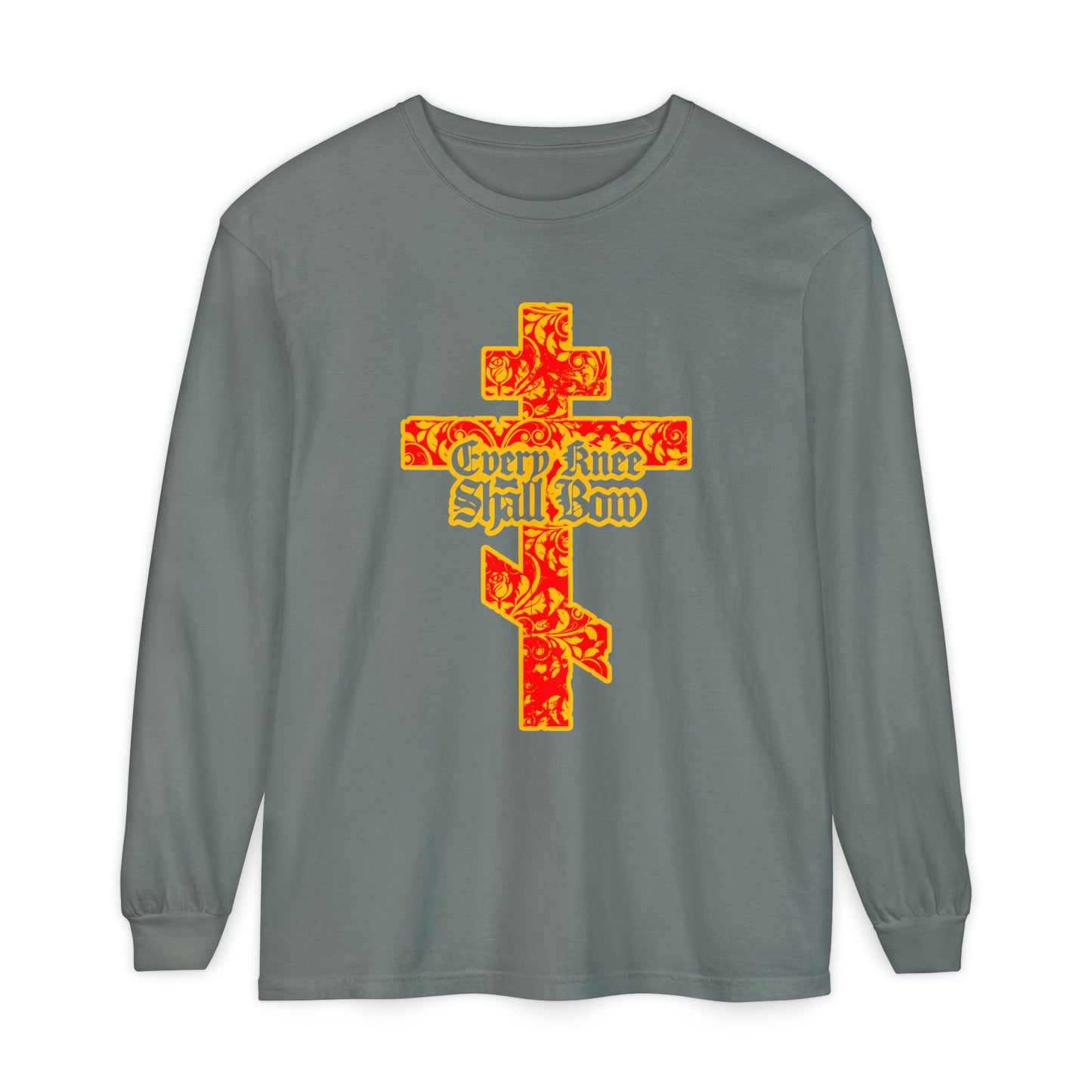 The "Every Knee Shall Bow" long sleeve features a gold and red floral Orthodox cross with gothic lettering, referencing Isaiah 45:22-24 and Phil 2:7-11, celebrating righteousness in Jesus Christ.