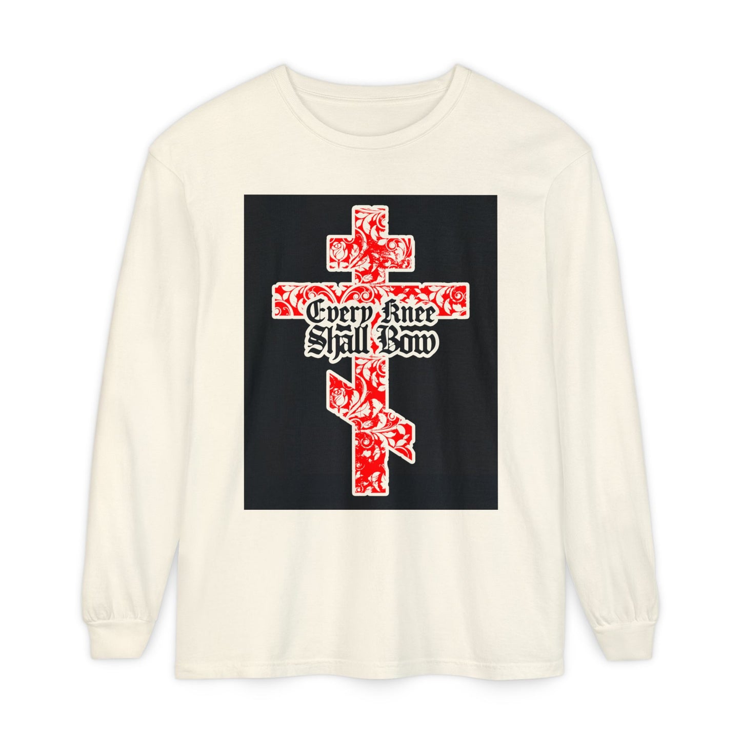 Cream long-sleeve shirt featuring a gold and red floral Orthodox cross with gothic "Every Knee Shall Bow" text, inspired by Isaiah 45:22-24 and Philippians 2:7-11, declaring Jesus Christ is Lord.