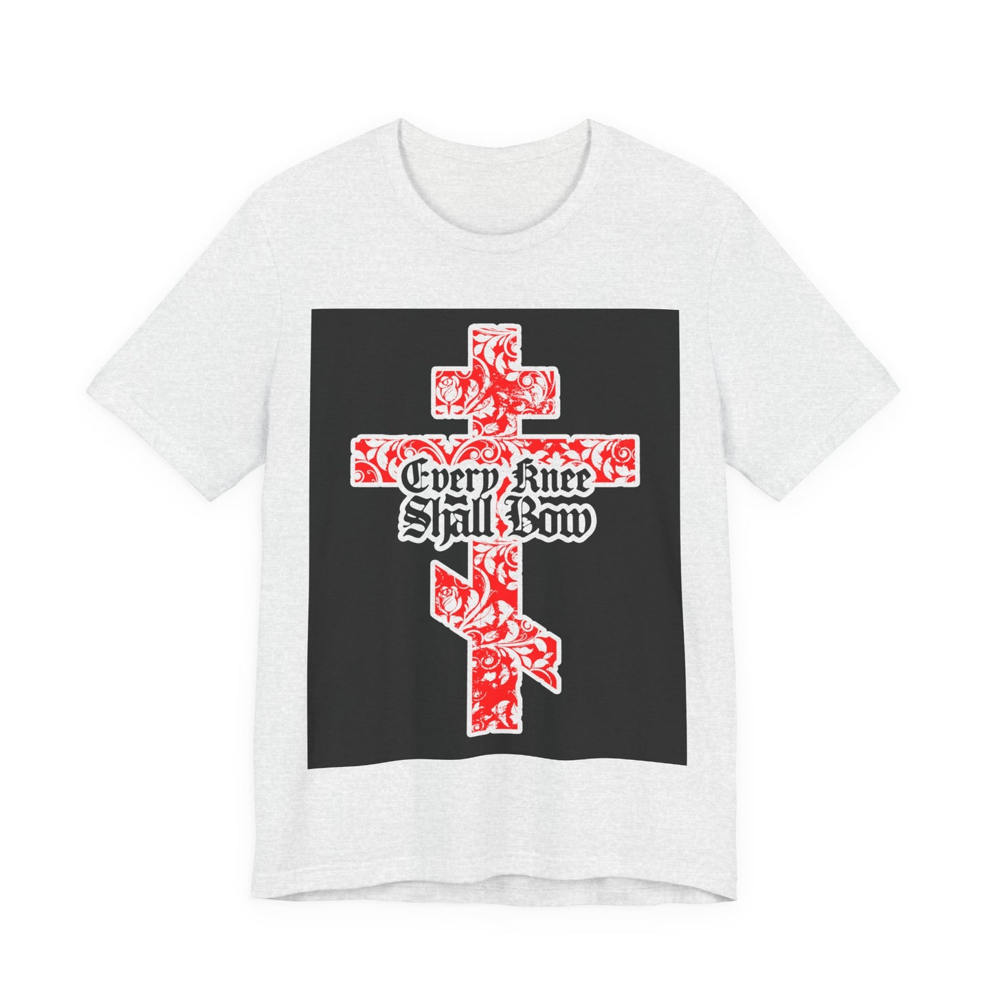 White unisex tee featuring a gold and red floral Orthodox cross with gothic “Every Knee Shall Bow” text, inspired by Isaiah 45:22-24 & Phil 2:7-11, proclaiming Jesus Christ’s majesty.