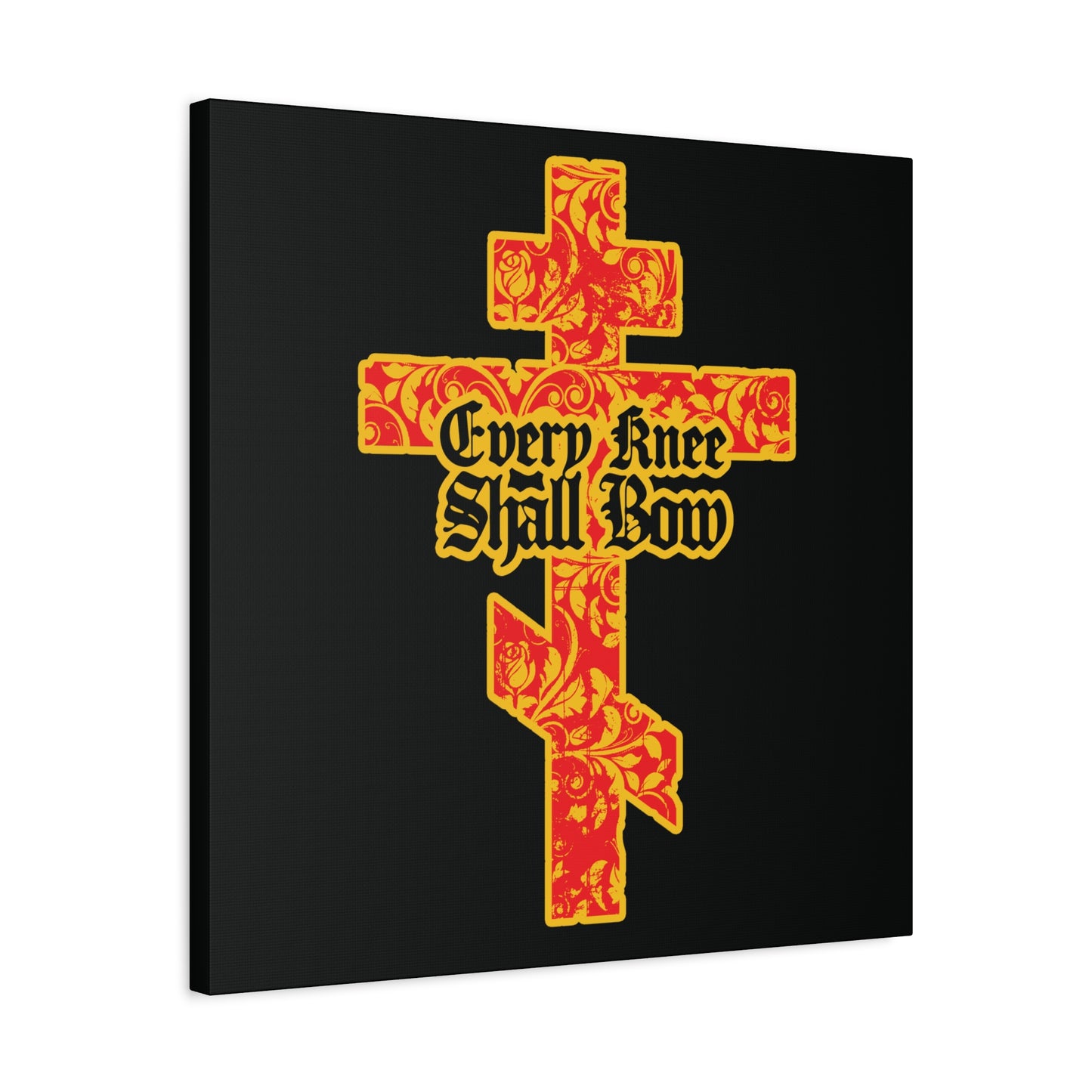 A gold and red floral-textured Orthodox cross with gothic lettering reads "Every Knee Shall Bow" and "Jesus Christ is Lord," referencing Isaiah 45:22-24 and Phil 2:7-11, on black—Christian wall art.