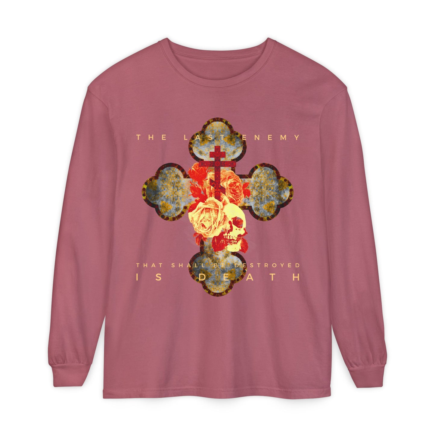 The Final Enemy That Shall Be Destroyed Is Death (1 Cor 15:26) long-sleeve by Remembrance of Death features a metallic gothic cross, rose, and skull graphic inspired by the resurrection. The design reads: “The last enemy that shall be destroyed is death.”.