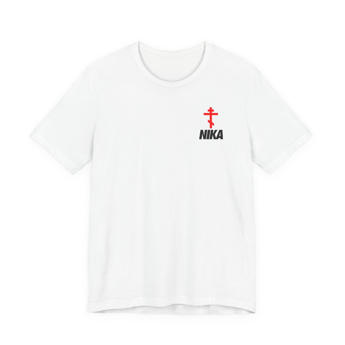 White t-shirt featuring a small Orthodox Cross and bold NIKA text—a mashup of NIKE logo and Christian symbolism—representing "Jesus Christ Conquers" on the left chest; Athletic Ascetic fashion.