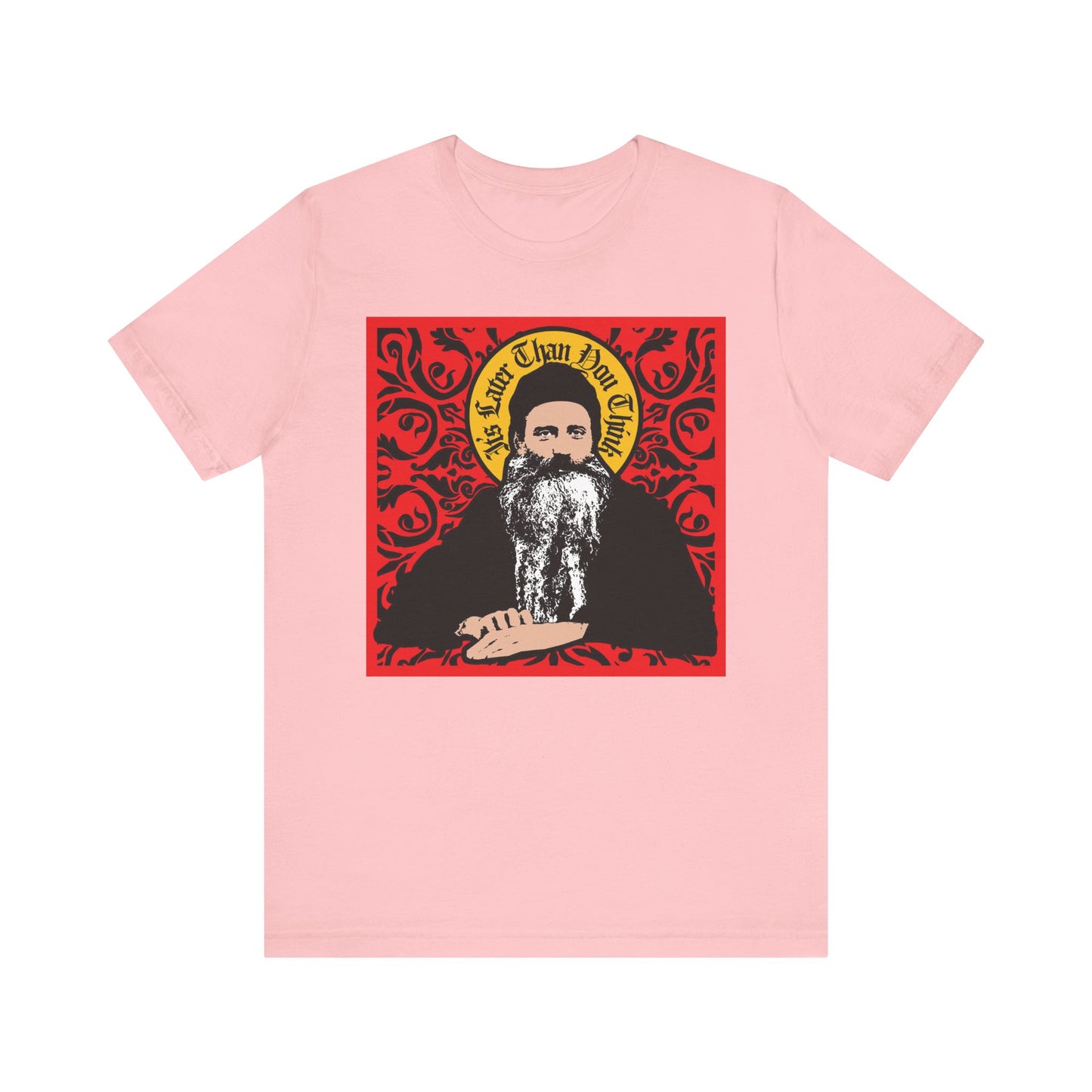Pink “It’s Later Than You Think” lightweight cotton tee, featuring a Saint Seraphim Rose icono-graphic design with a red ornate background. Unisex fit, perfect for Orthodox Christians seeking inspiration and style.