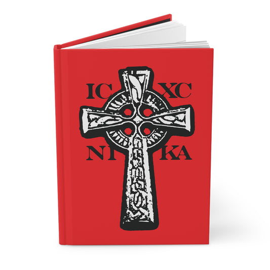 The ICXC NIKA Celtic Knotwork Cross Orthodox Christian blank journal features a black and white cross and “IC XC NIKA” on a red cover, symbolizing Jesus Christ conquers. Traditional and perfect for spiritual writing.