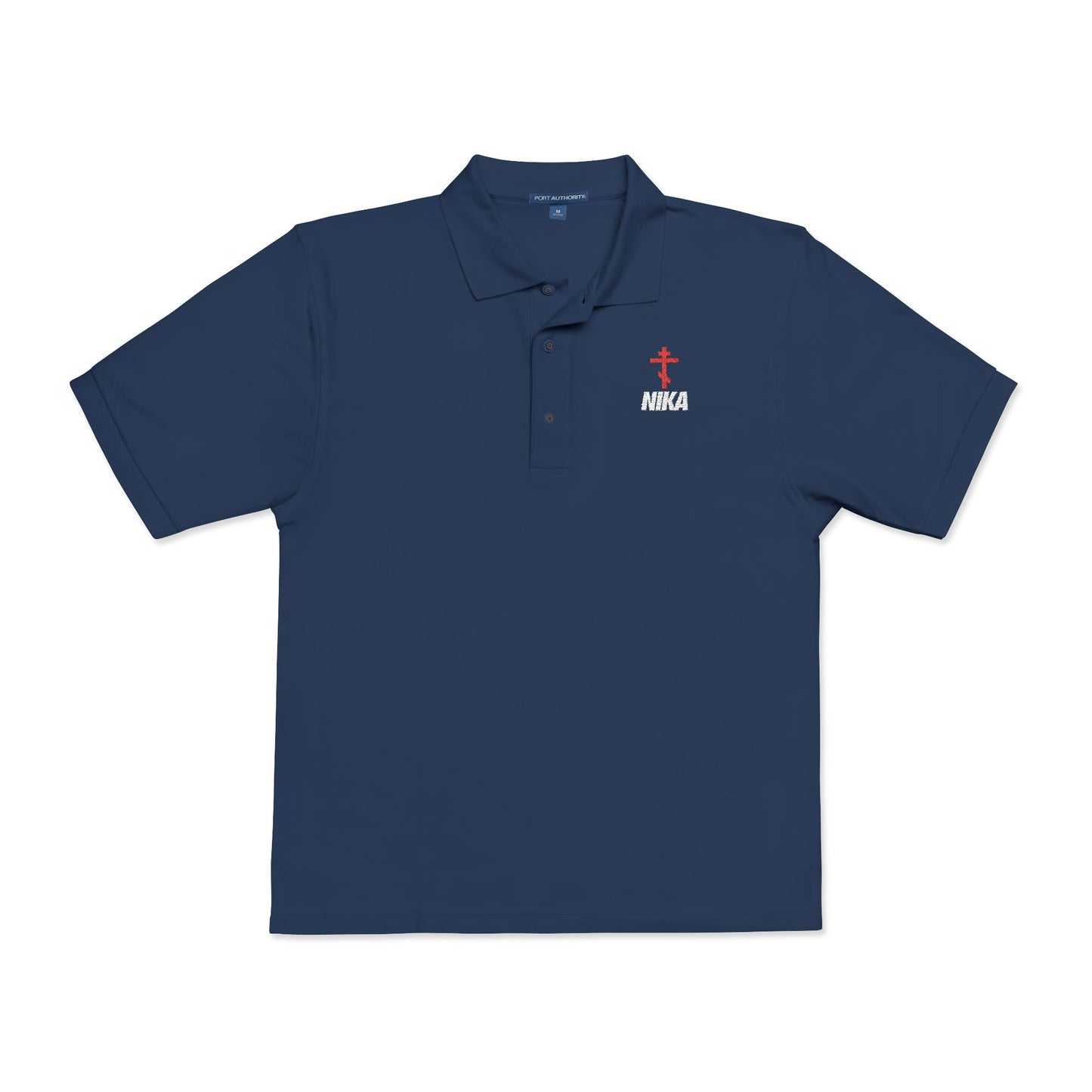 The NIKA Red Orthodox Cross White Text polo is a navy athletic ascetic shirt, featuring an embroidered red Orthodox cross and "NIKA" on the chest—a Christian fashion statement inspired by the NIKE logo and Jesus Christ Conquers.
