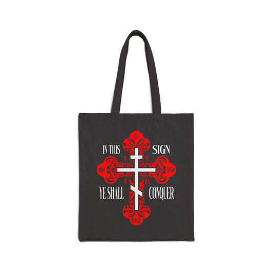 Black canvas tote bag featuring a red ornate Orthodox Cross and the phrase "In This Sign Ye Shall Conquer"—inspired by ICXC NIKA and the victorious Cross of Jesus Christ.