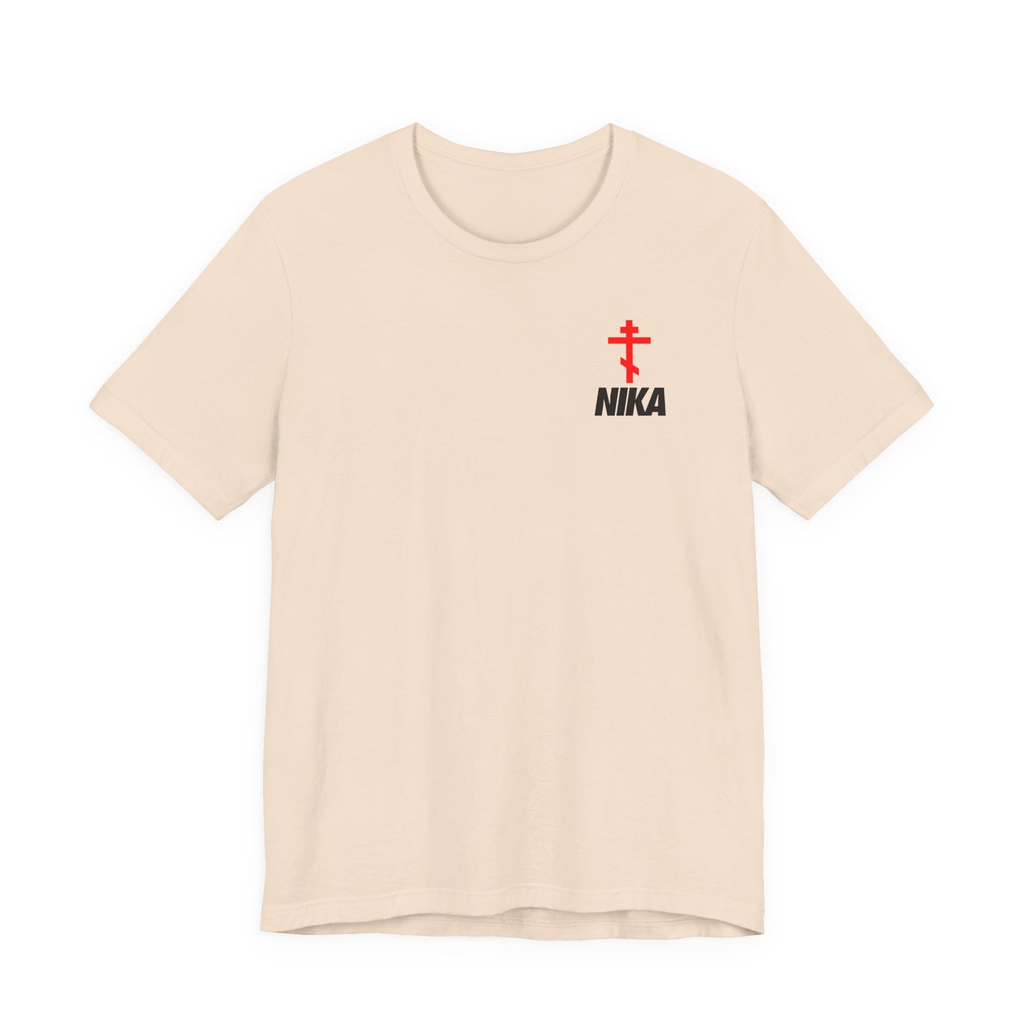 Soft cream t-shirt featuring an Orthodox cross with bold NIKA text in a small sporty design inspired by the NIKE logo; symbolizes "Jesus Christ Conquers"—a unique blend of athletic and ascetic Christian fashion.