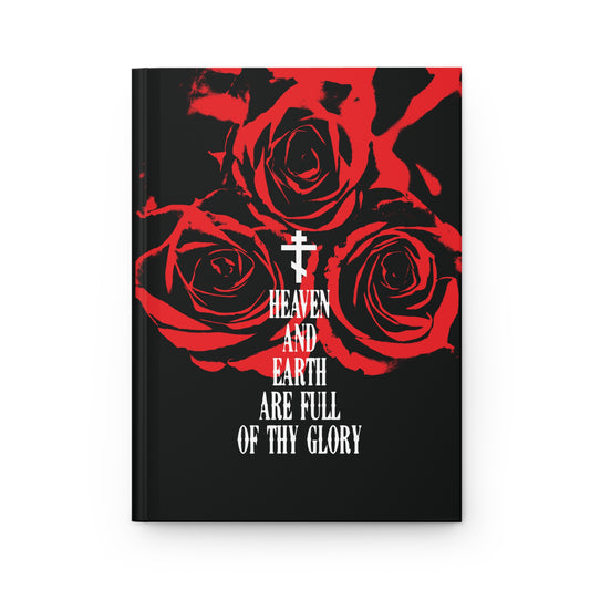 The "Heaven and Earth Are Full of Thy Glory" hardcover journal by Remembrance of Death features bold white text, three vivid red roses, and a white cross, inspired by the Orthodox liturgical hymn and Divine Liturgy of St. John Chrysostom.