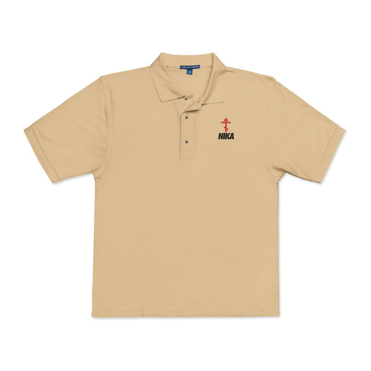 Stone short-sleeve polo featuring a red Orthodox cross and black "Jesus Christ Conquers" text, inspired by Revelation 3:21. Emulates the NIKE logo in an athletic ascetic style. Christian embroidered design on the left chest.