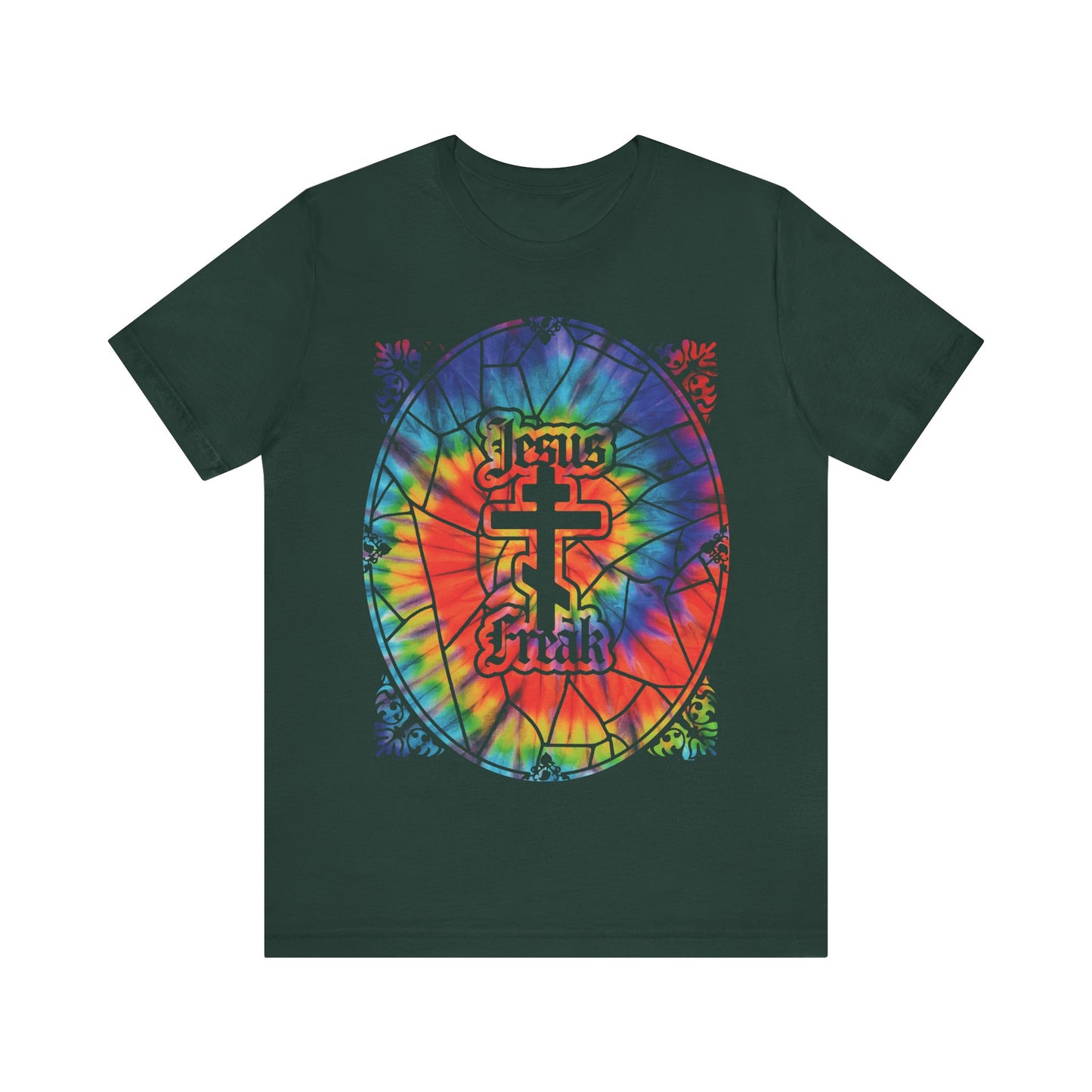 Dark green unisex tee featuring a tie-dyed stained glass window design, Orthodox cross, and "Jesus Freak" in gothic text—a tribute to the 70s Jesus Movement hippie era.
