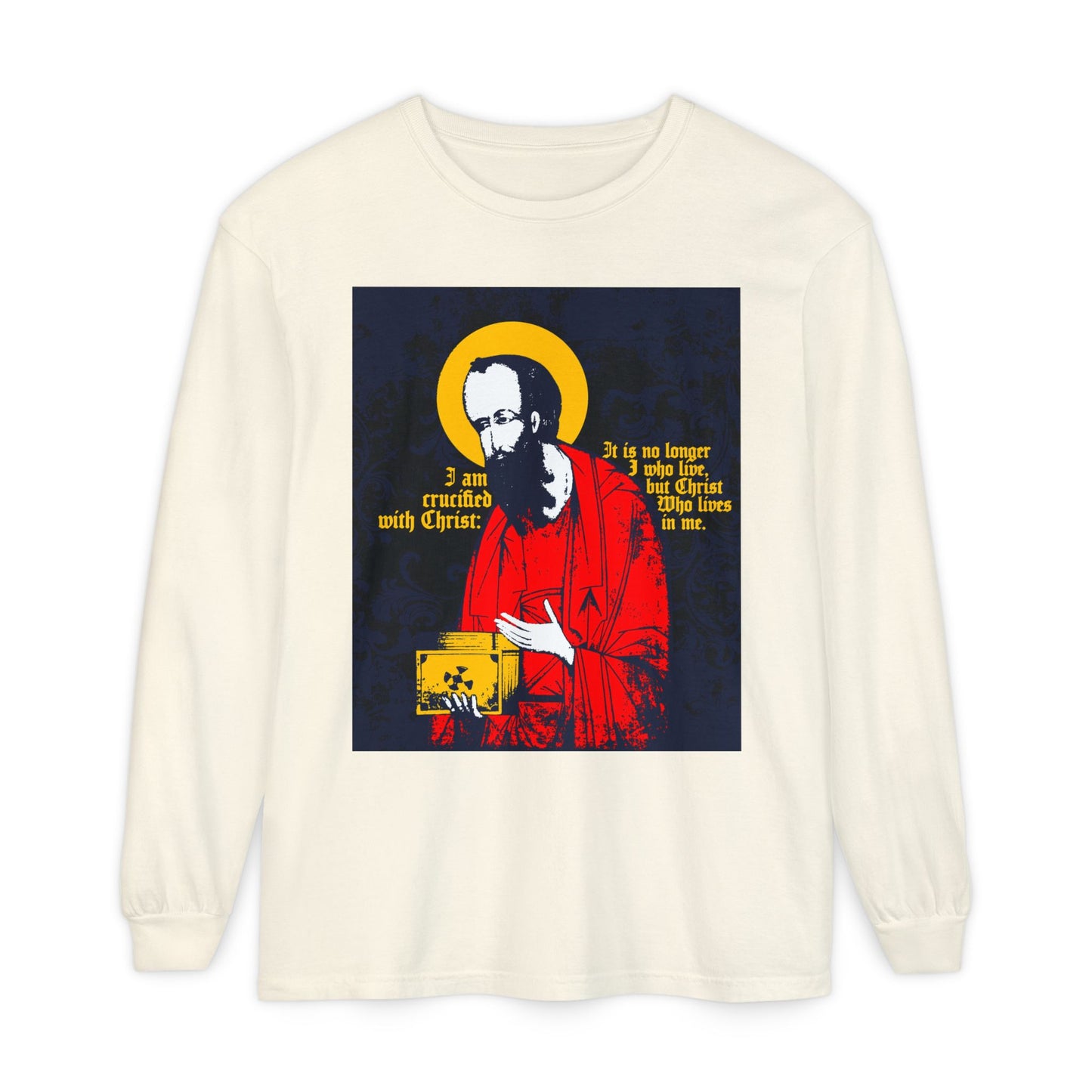 Ivory long-sleeve shirt featuring St. Paul holding the Gospel in iconographic style with "I am crucified with Christ" (Galatians 2:20) in red, yellow, and black—an Orthodox Christian design inspired by new life in Him.