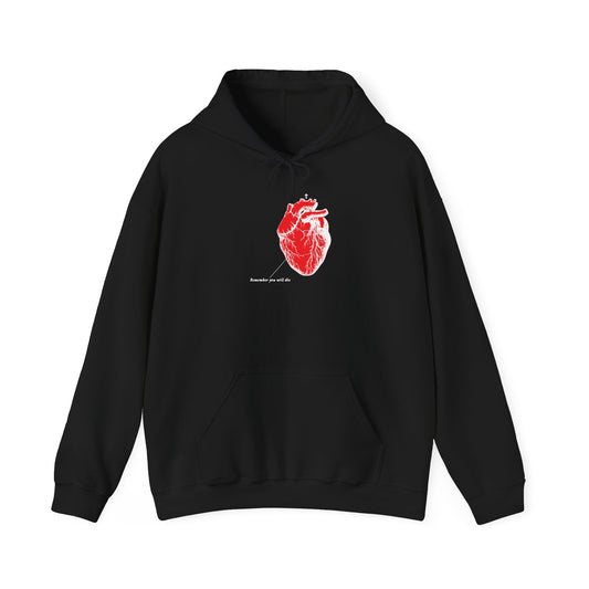 This black hoodie, named Remember You Will Die from the Gildan 18500 collection, showcases a red anatomical heart graphic with white text, ideal for fans of distinctive athletic streetwear.