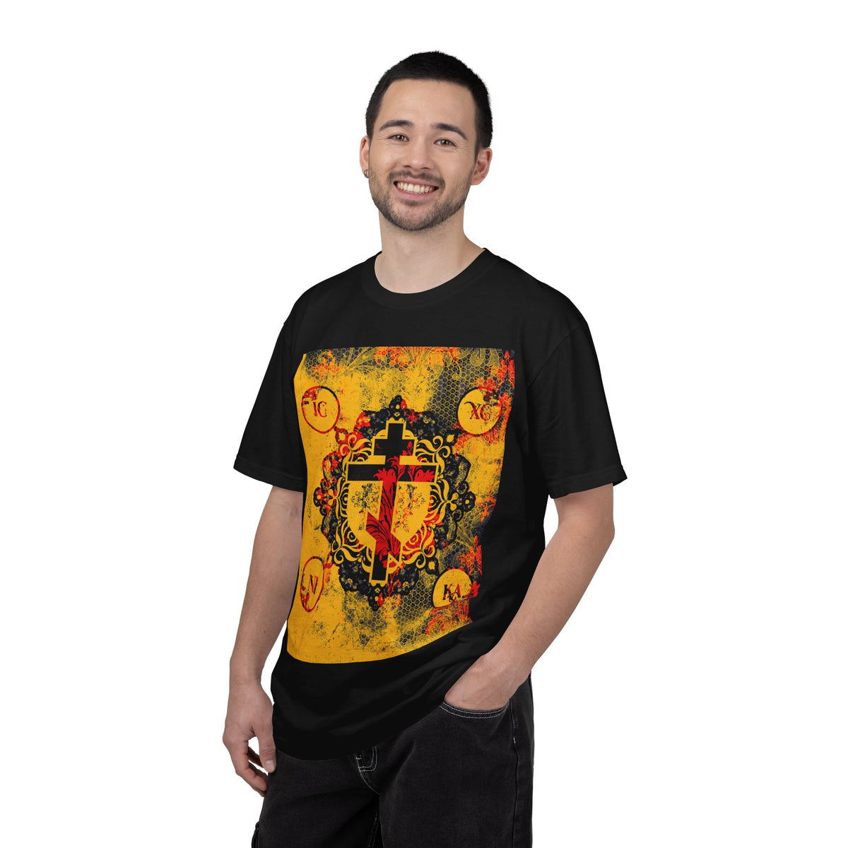 Man in an IC XC NIKA Orthodox Cross T-shirt featuring a yellow and red cross design.