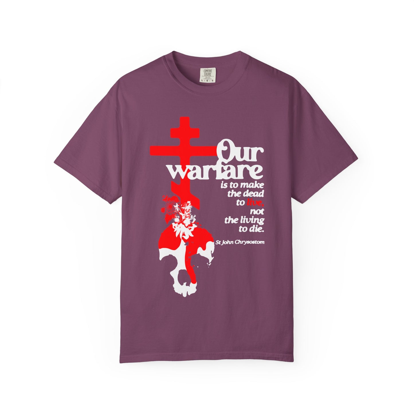 Berry heavyweight cotton unisex tee featuring an Orthodox cross, white and red text, and a white skull with flowers and leaves—a striking design inspired by St. John Chrysostom’s reminder that "Our Warfare is to Make the Dead to Live.