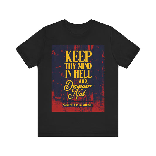 Black Orthodox Christian t-shirt featuring yellow and white text: “Keep Thy Mind in Hell and Despair Not” by St. Silouan the Athonite. Product: Keep Thy Mind in Hell and Despair Not (St. Silouan the Athonite) No. 1.