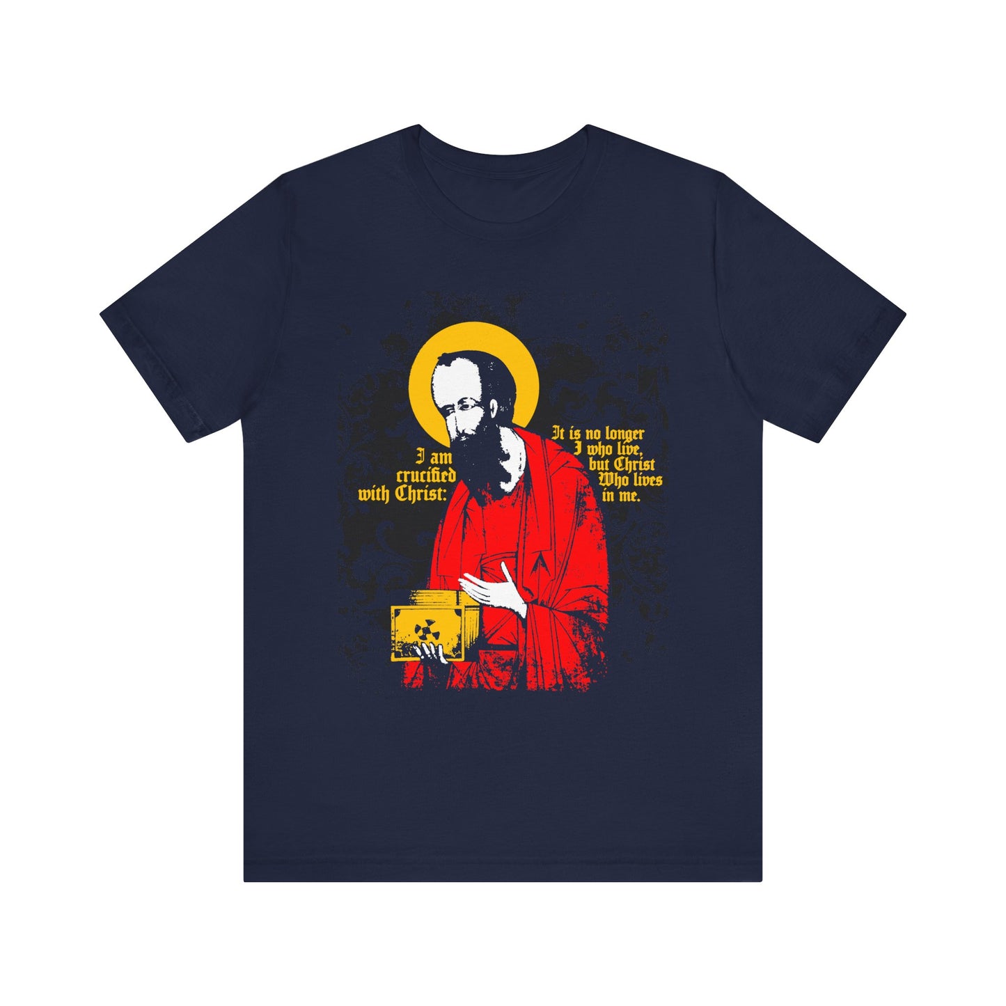 Show your faith with this navy St Paul Holding Gospel Iconographic unisex tee, crafted from lightweight cotton and featuring a stylized depiction of St. Paul holding the Gospel, adorned with a yellow halo and the powerful text from Galatians 2:20: "I am crucified with Christ.