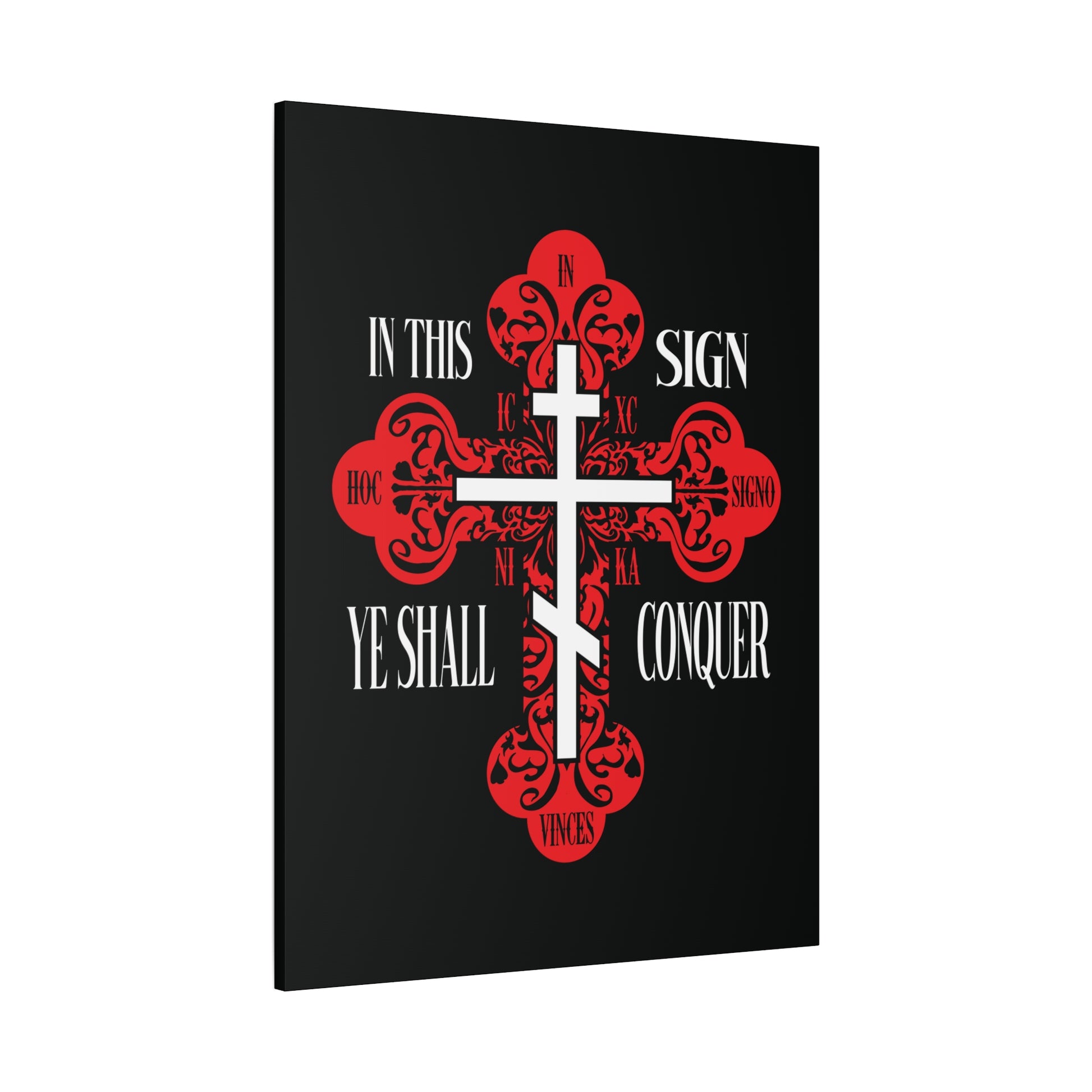 The "In This Sign Ye Shall Conquer" wall art features a red ornate Orthodox cross with the phrase "In Hoc Signo Vinces" on a black background, reflecting spiritual strength and faith in Jesus Christ.