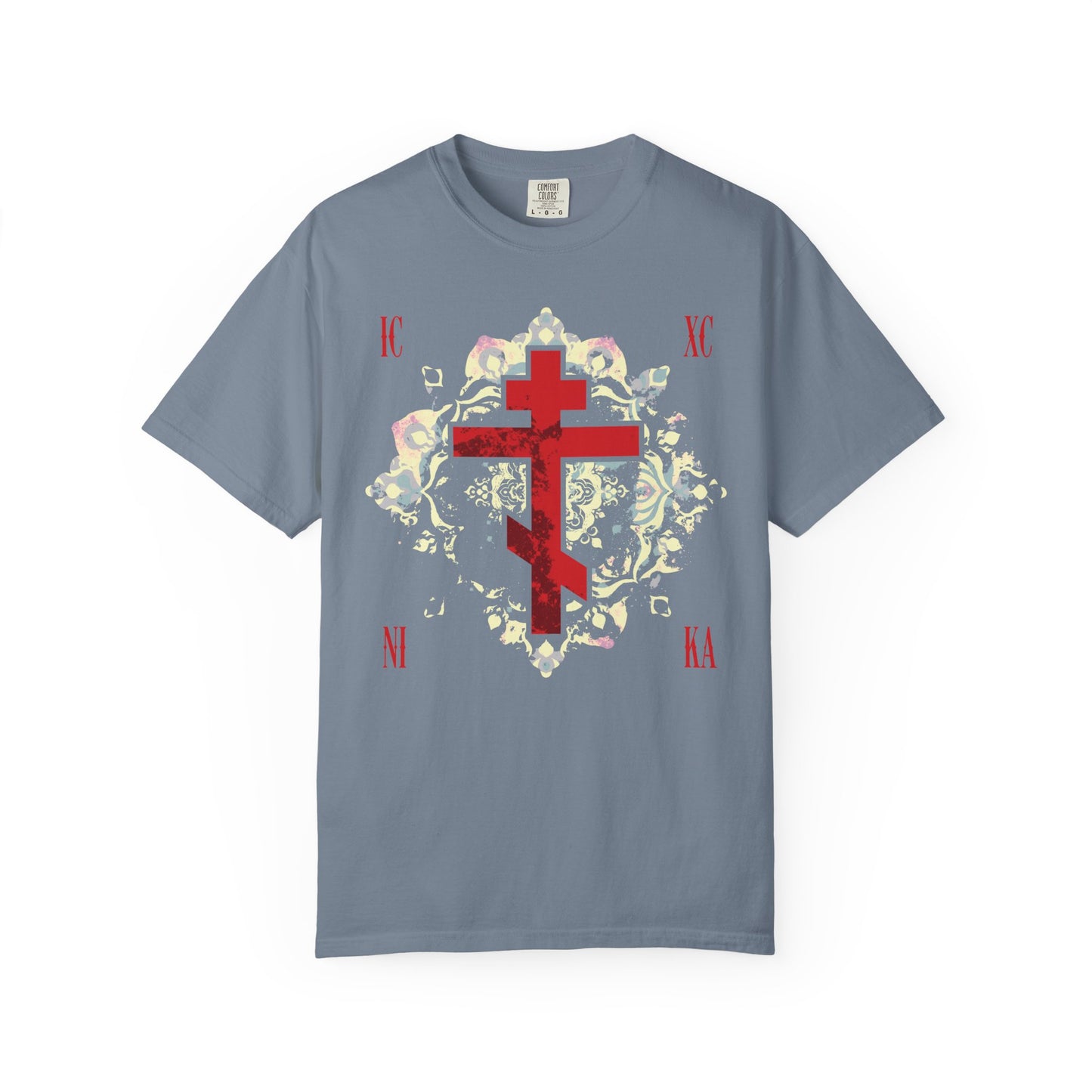 Blue Jean unisex heavyweight cotton tee featuring a textured red Orthodox cross with ICXC NIKA Greek letters and a medieval floral background—symbolizing Jesus Christ conquers and the triumph of faith.