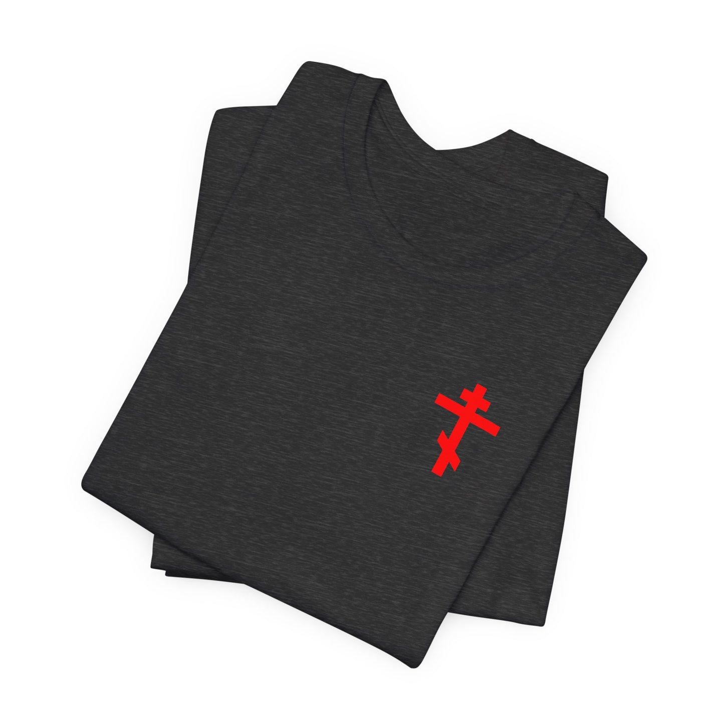 A folded dark grey heather "Idoloclast Idol Smasher Hammer" lightweight cotton unisex tee, featuring a small red cross on the front left breast, designed to inspire conversation with God and reflect the spirit of Divine Life.