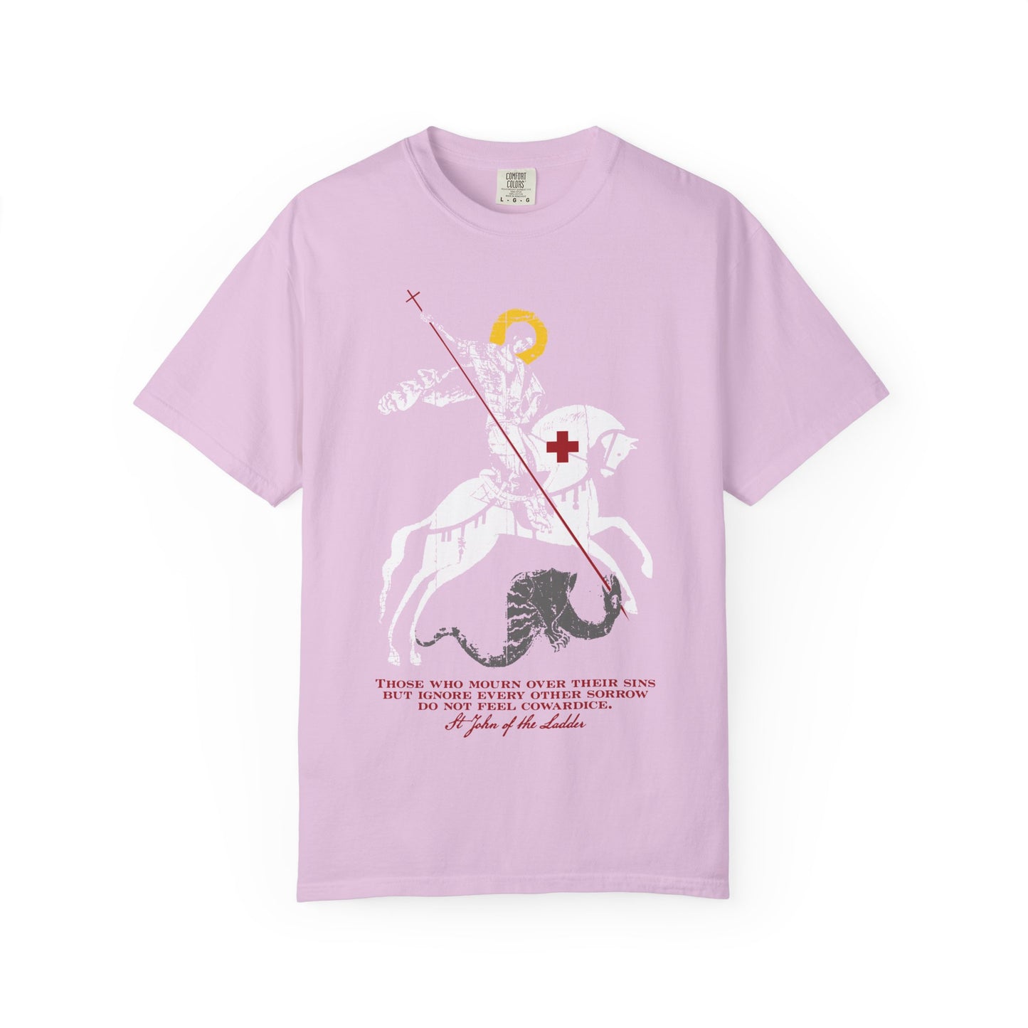 Orchid-colored heavyweight cotton unisex tee featuring a graphic of St George slaying the dragon, accented with a cross and text inspired by St John Climacus. This Orthodox Christian design symbolizes the battle against the sadness of soul and mourning according to God for those who mourn over their sins.