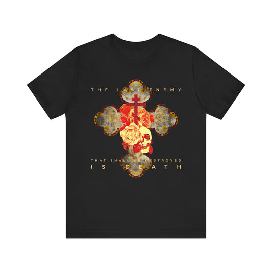 Black lightweight cotton unisex tee featuring a metallic gothic cross, rose, and skull design with the text “The Final Enemy That Shall Be Destroyed Is Death” (1 Cor 15:26); a bold reminder of Christ’s resurrection.
