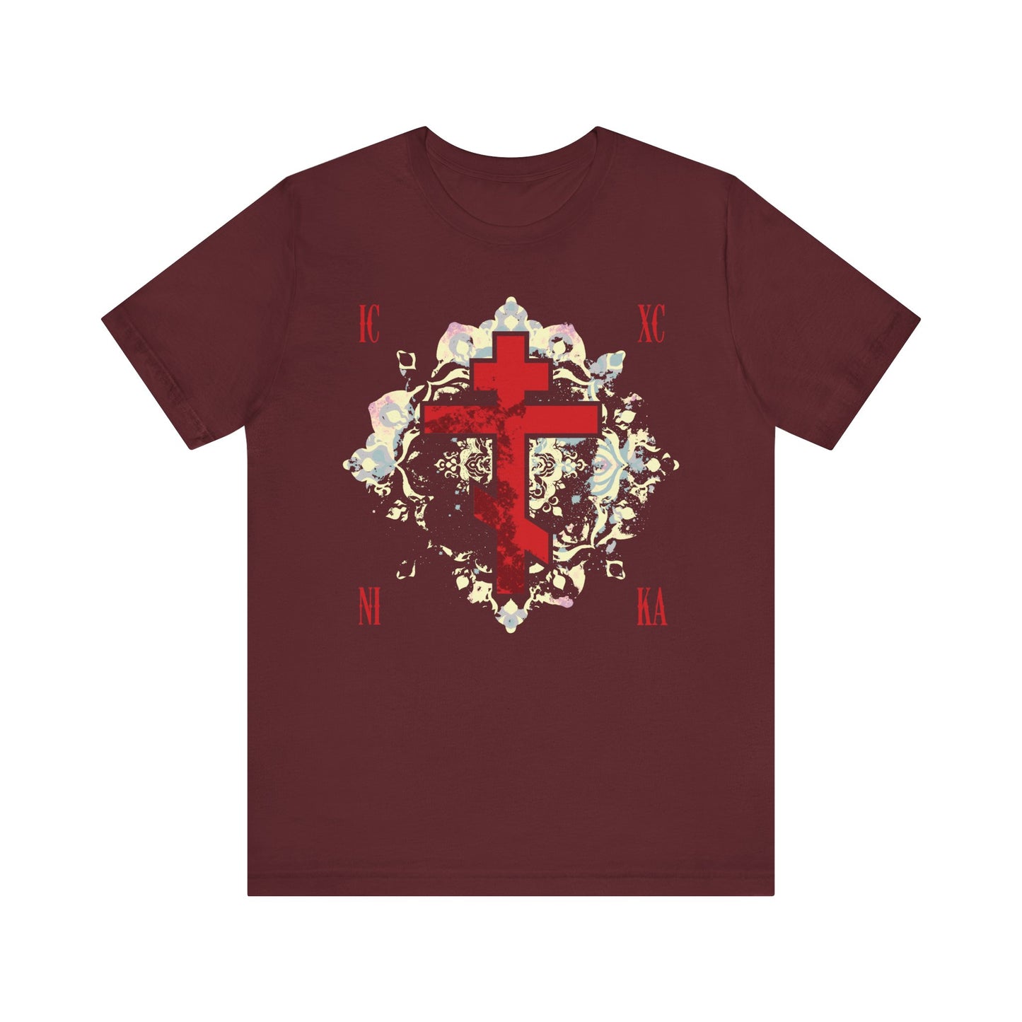 Maroon ICXC NIKA t-shirt with a textured red Orthodox cross and medieval floral background, inspired by the message “Jesus Christ Conquers.” Lightweight cotton unisex tee.