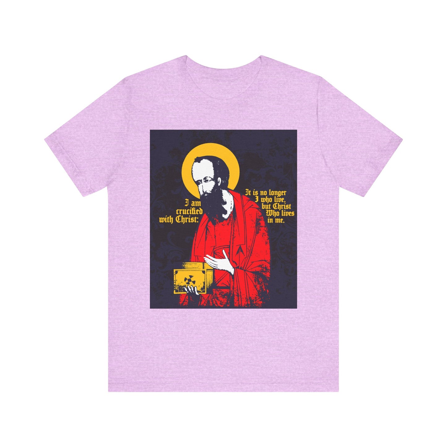 St Paul Holding Gospel Iconographic | I am crucified with Christ (Galatians 2:20) – This Orthodox Christian lightweight cotton unisex tee in Heather Prism Lilac features a graphic of St. Paul with the Gospel and yellow text declaring, “I am crucified with Christ. It is no longer I who live, but Christ who lives in me”—a powerful reminder of our new life in Christ through faith.